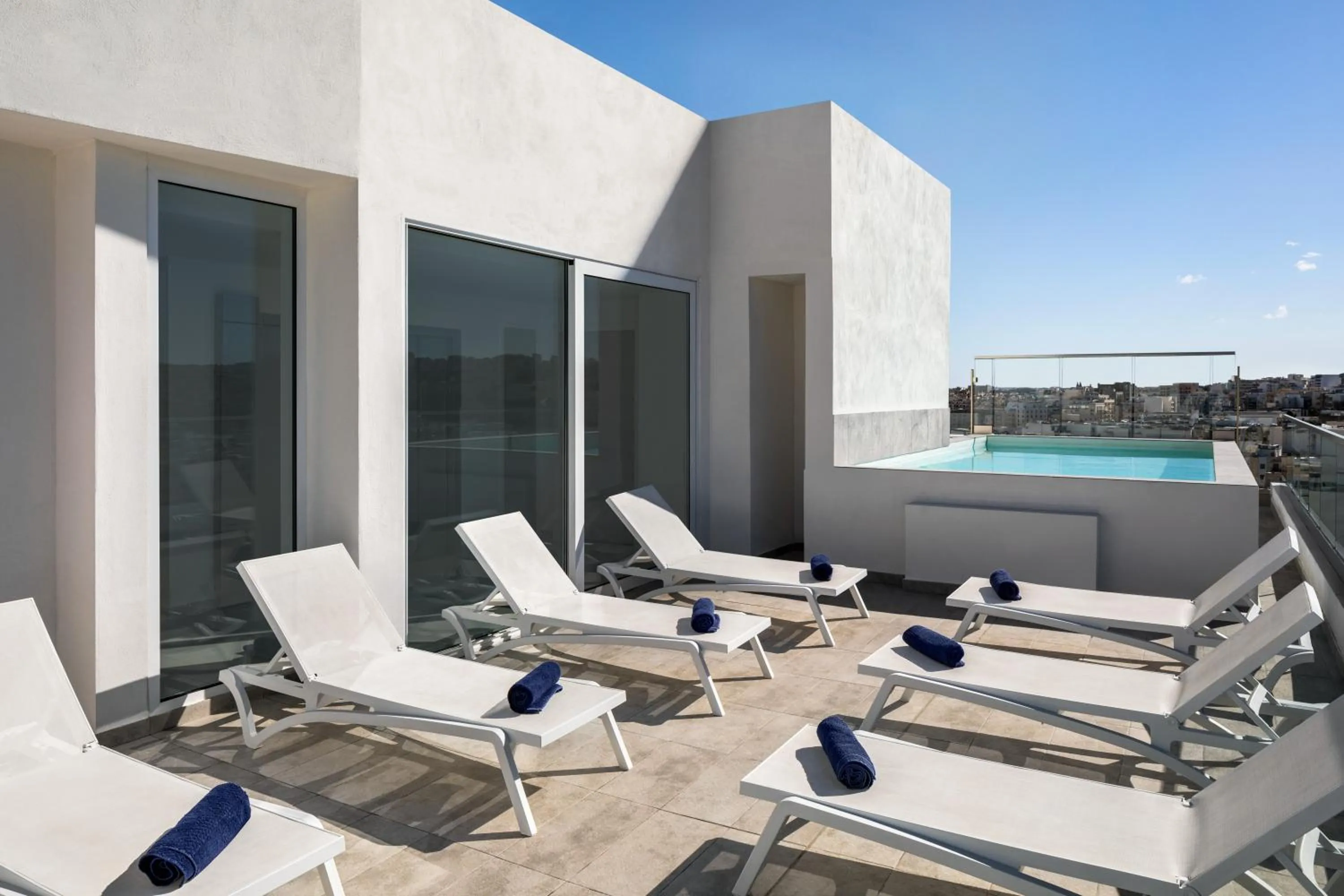 Swimming pool in QUADRO Hotel