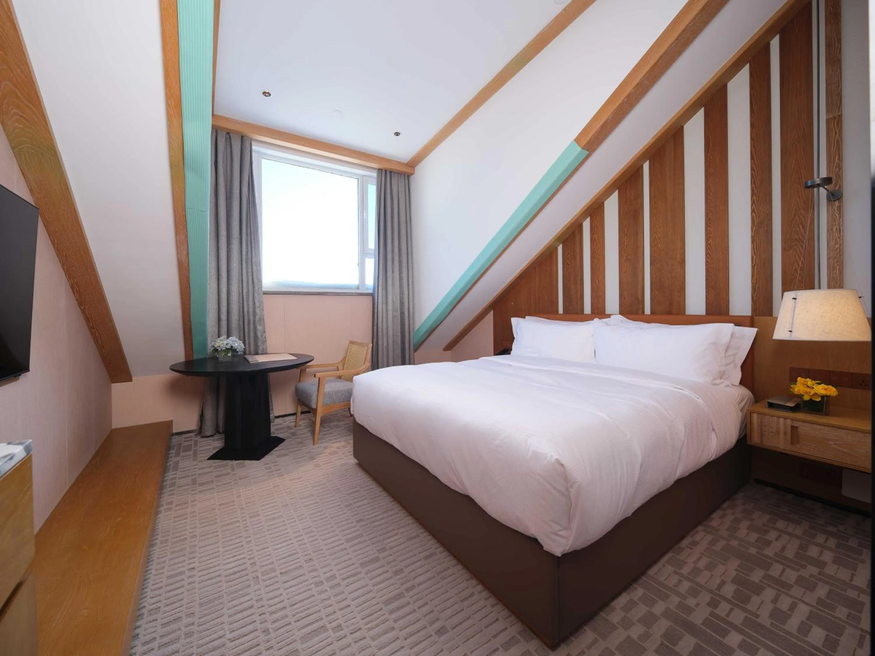 Bed in DoubleTree by Hilton Changbaishan Hot Spring