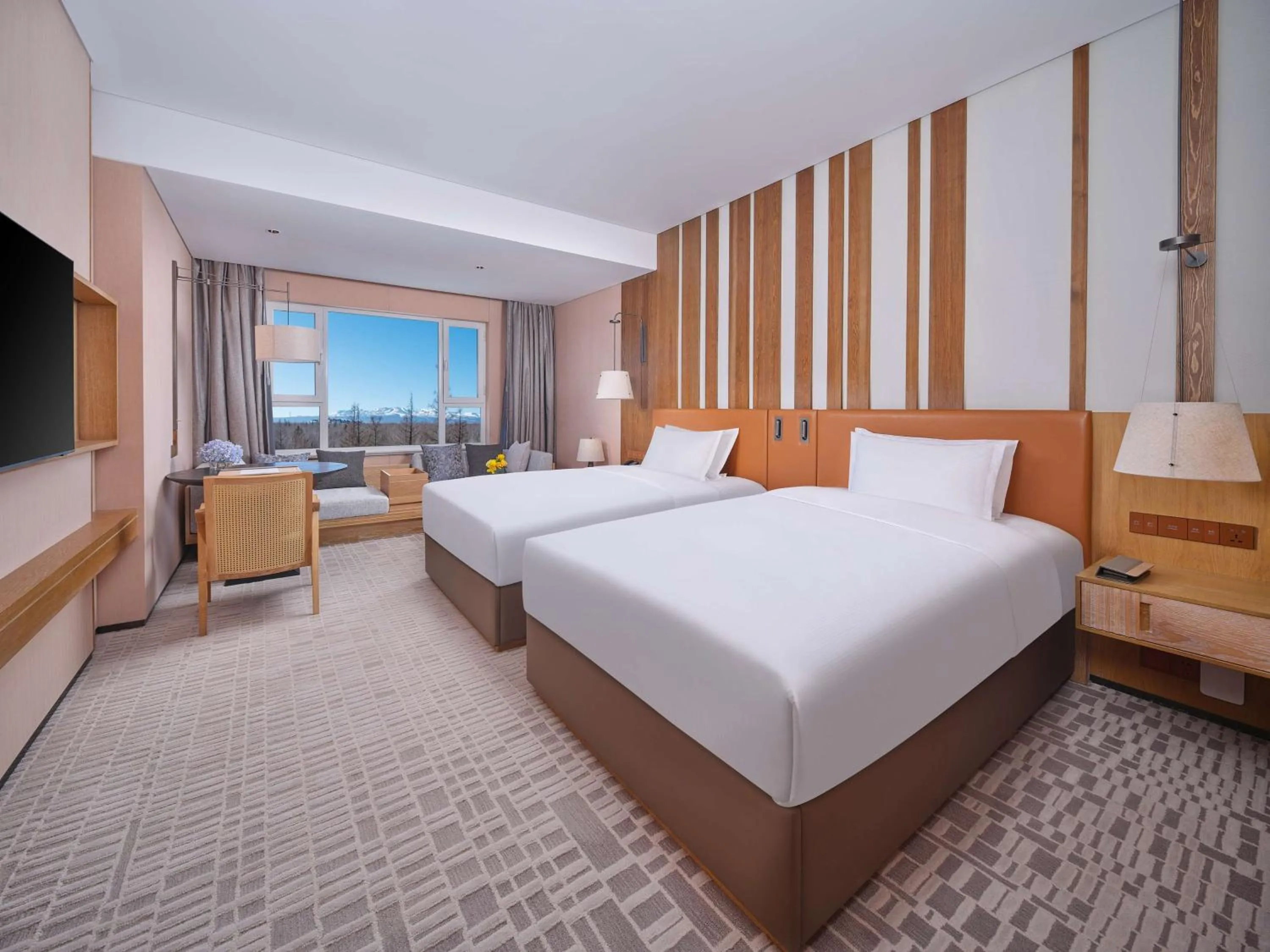 Living room, Bed in DoubleTree by Hilton Changbaishan Hot Spring