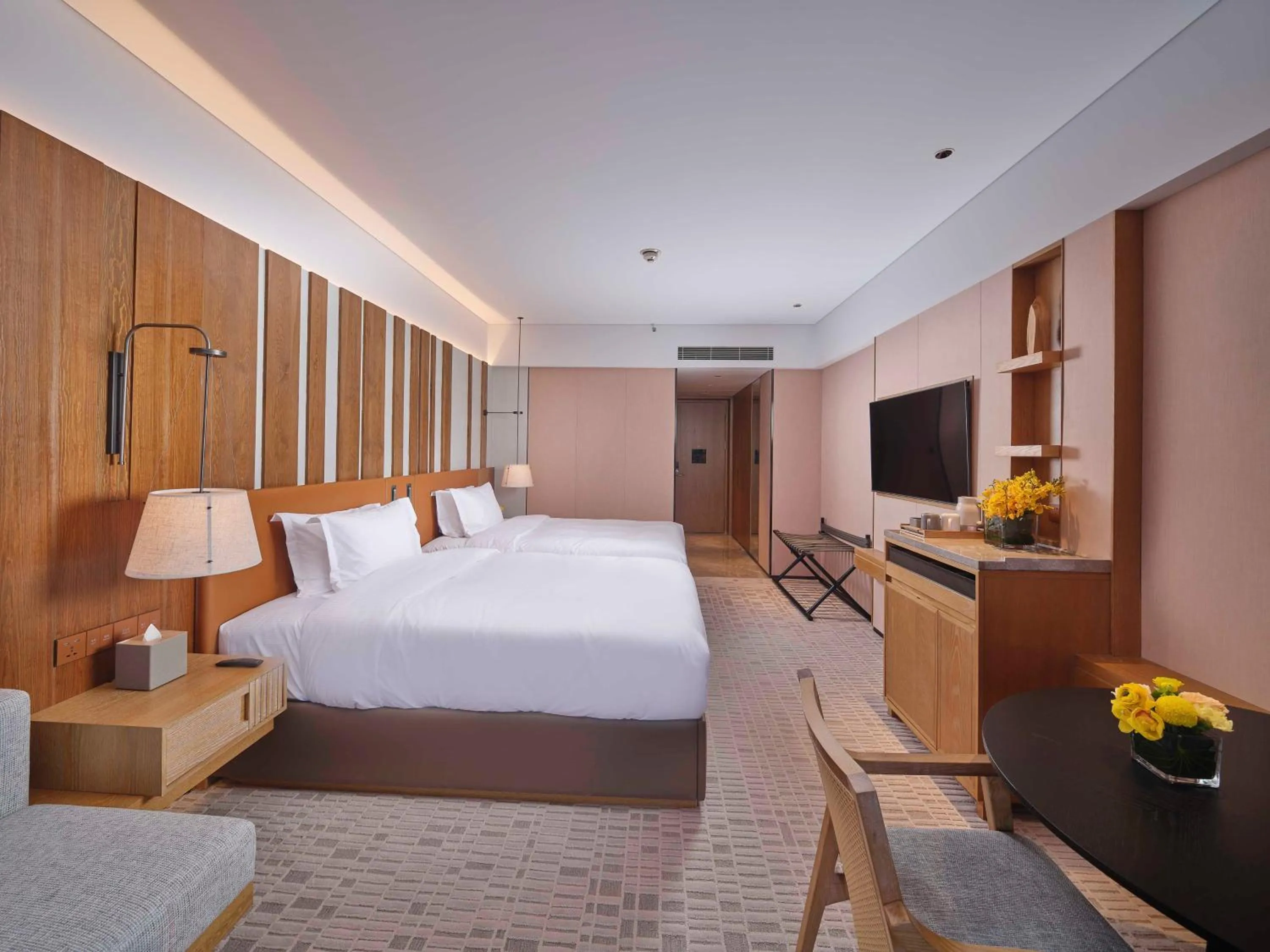 Bed in DoubleTree by Hilton Changbaishan Hot Spring