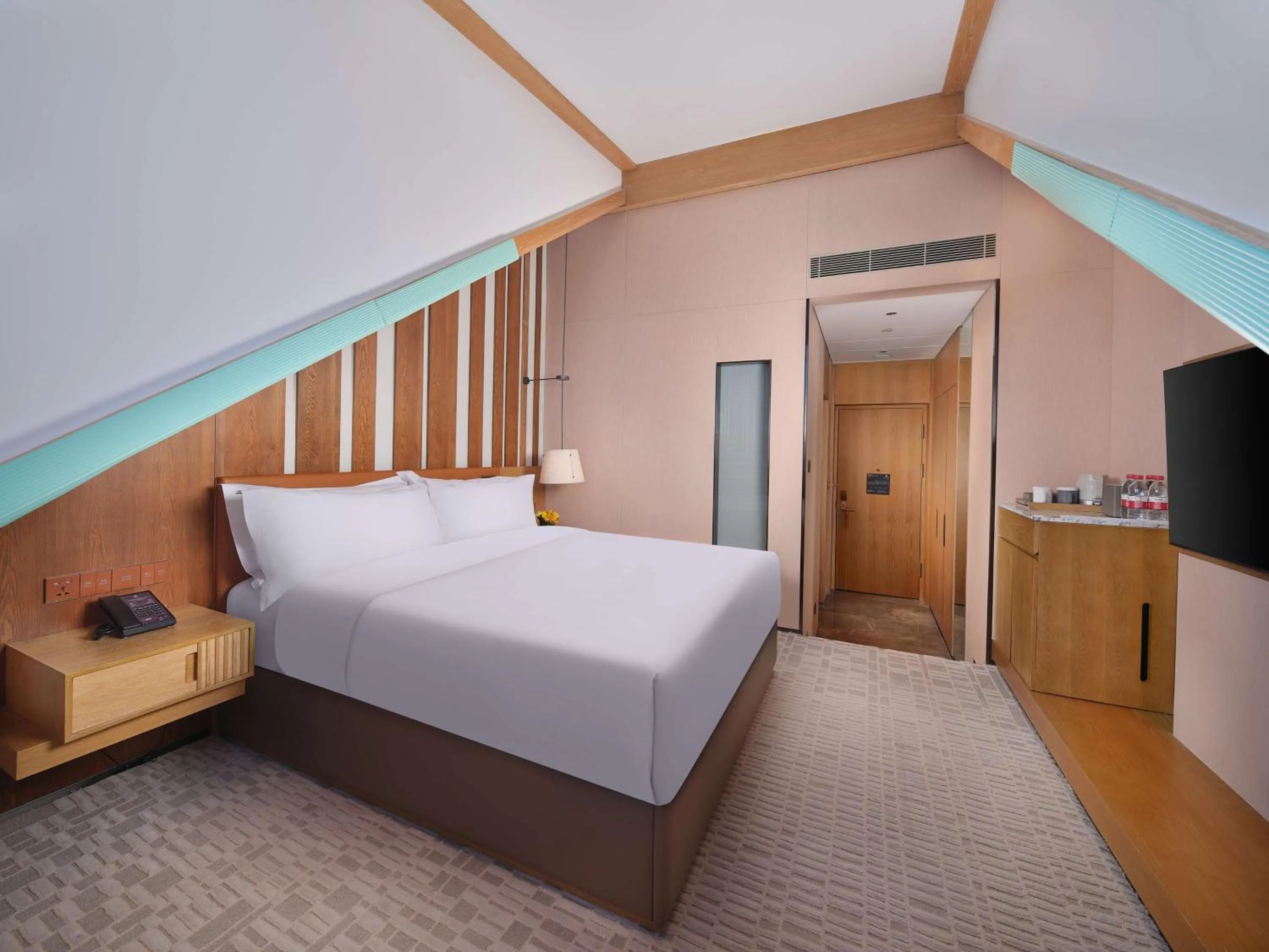 Bed in DoubleTree by Hilton Changbaishan Hot Spring