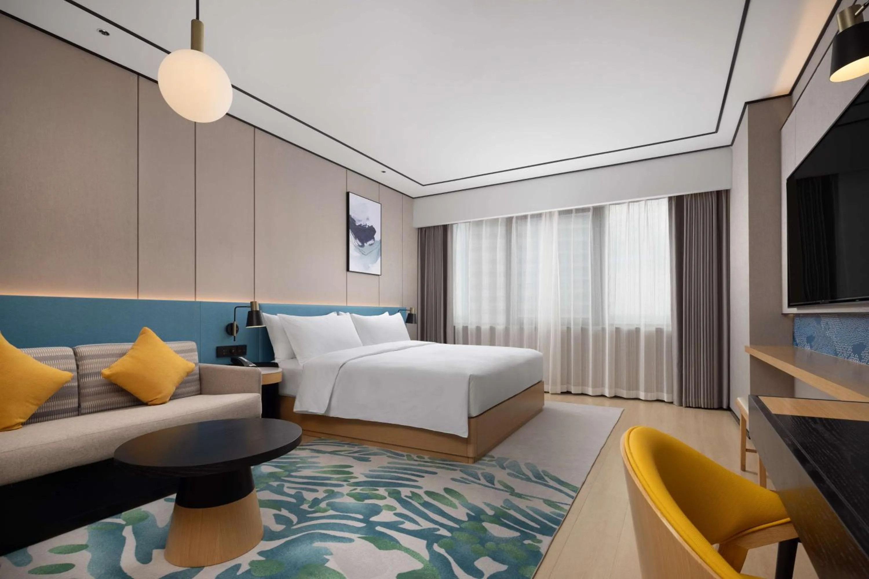 Living room, Bed in Hilton Garden Inn Zigong High-Tech Zone