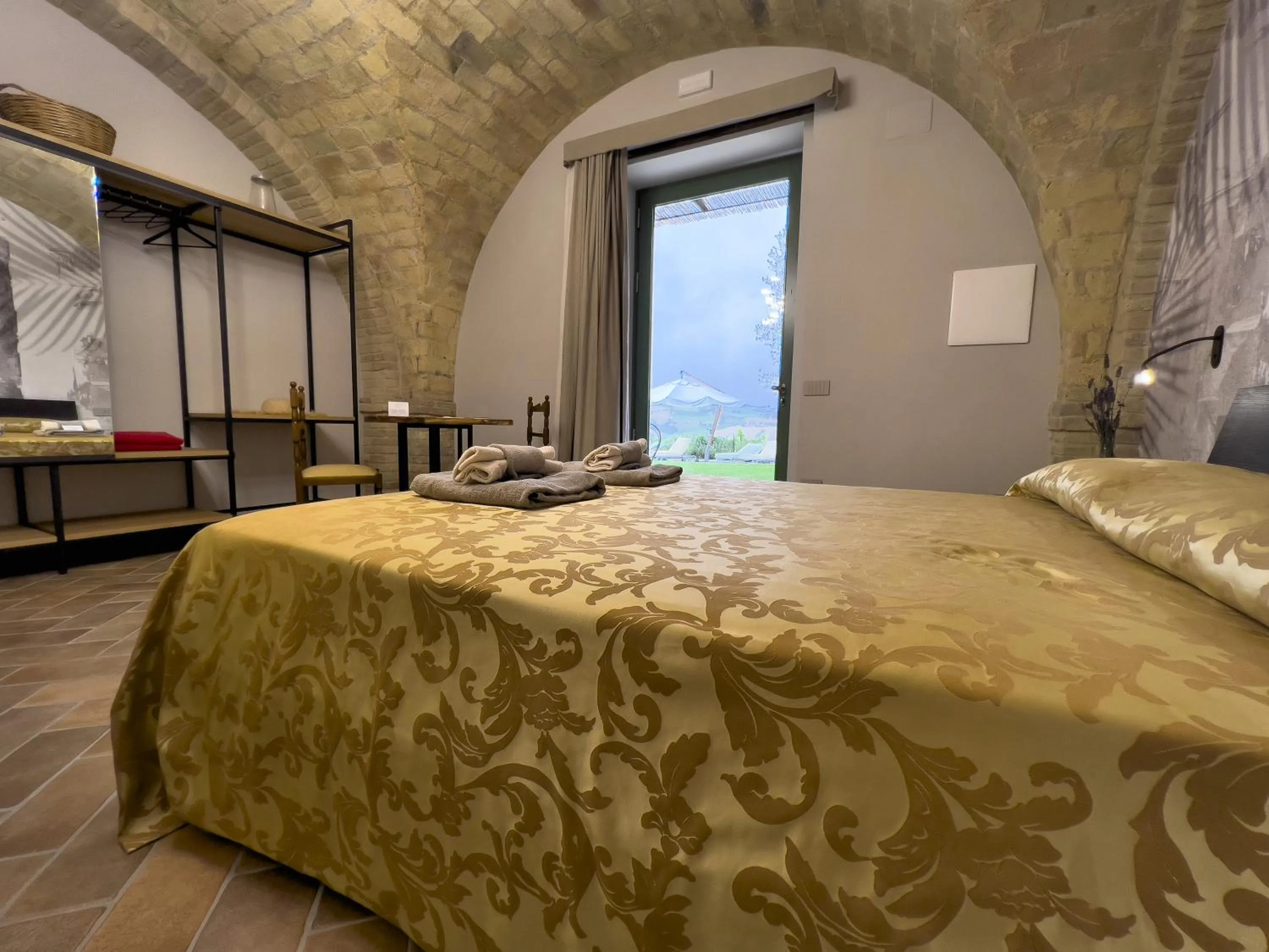 Photo of the whole room, Bed in Relais Cocci Grifoni - Panoramic Wine Resort