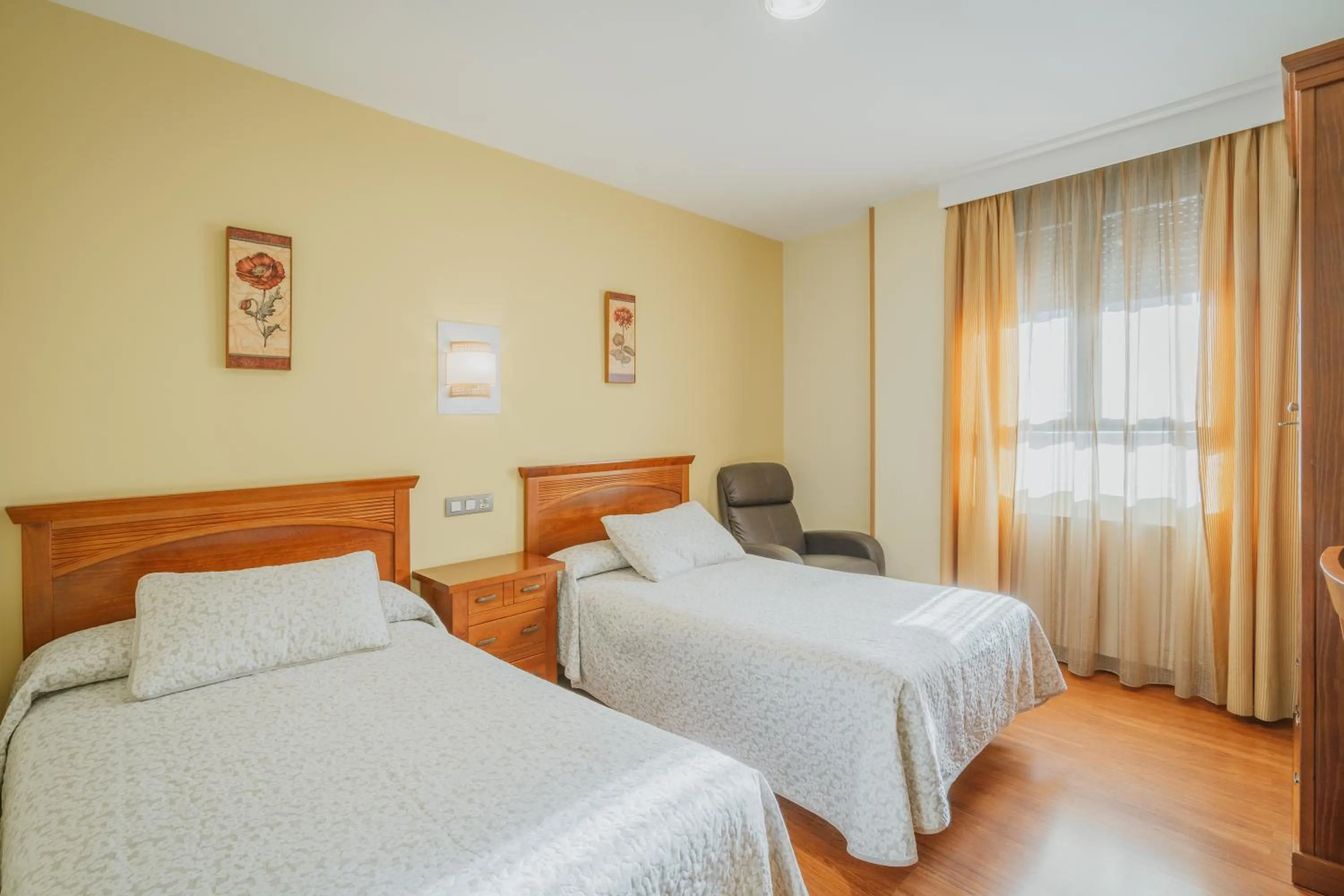 Bed in Hotel Reina Isabel