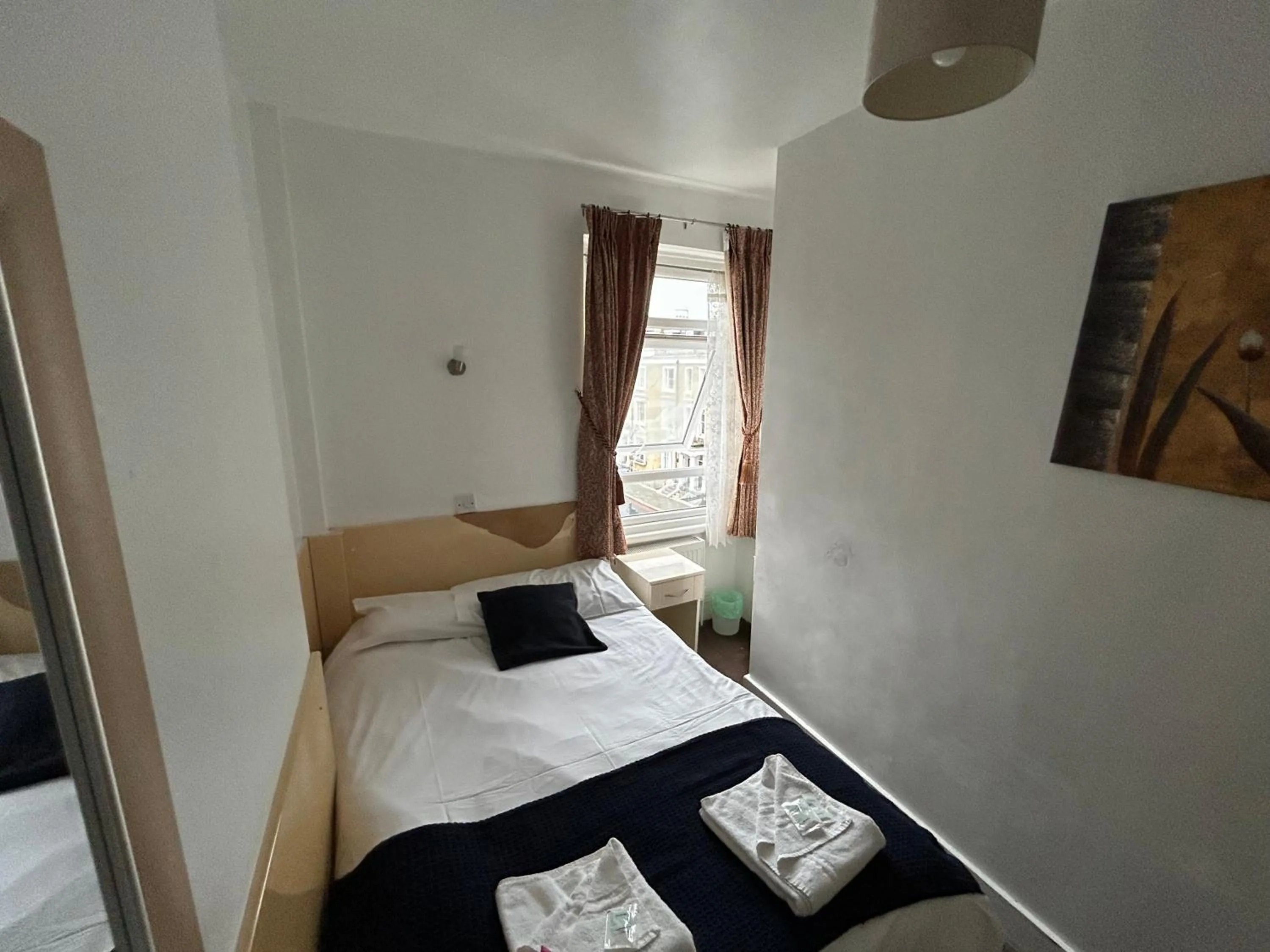 Bed in Earls Court Hotel