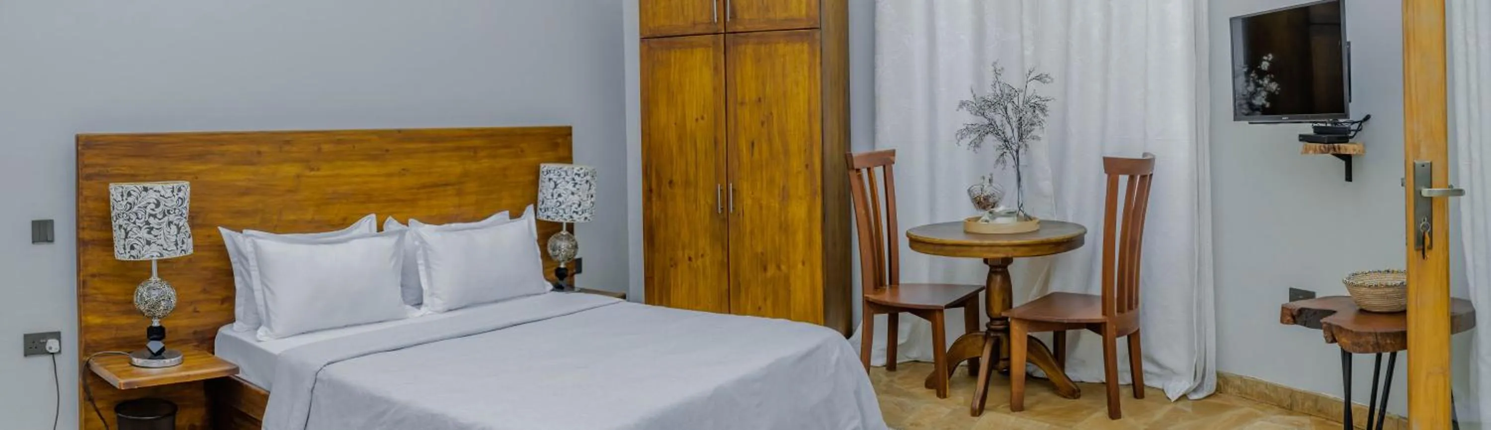 Bed in Tulivu Kilimanjaro Retreat