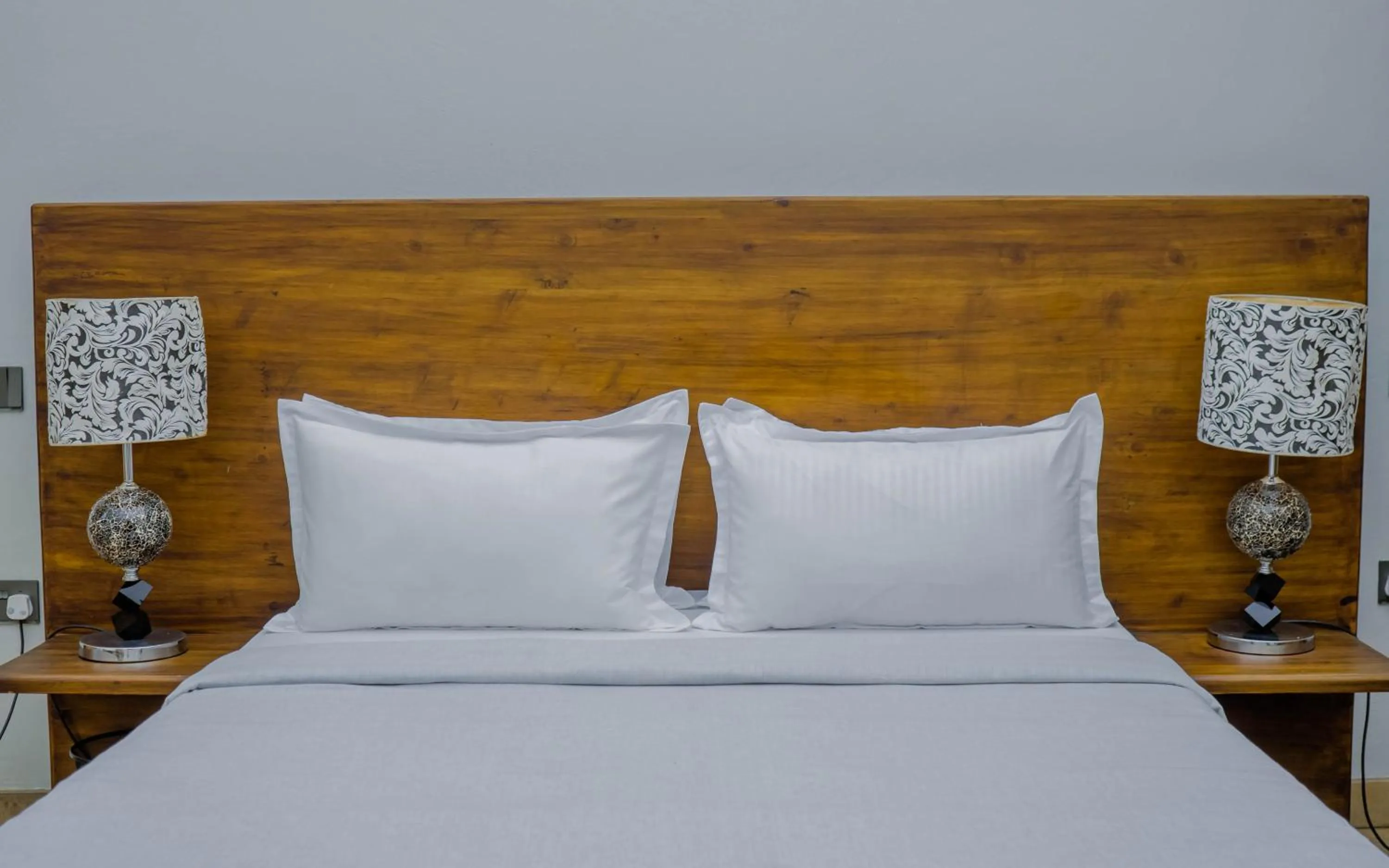 Bed in Tulivu Kilimanjaro Retreat