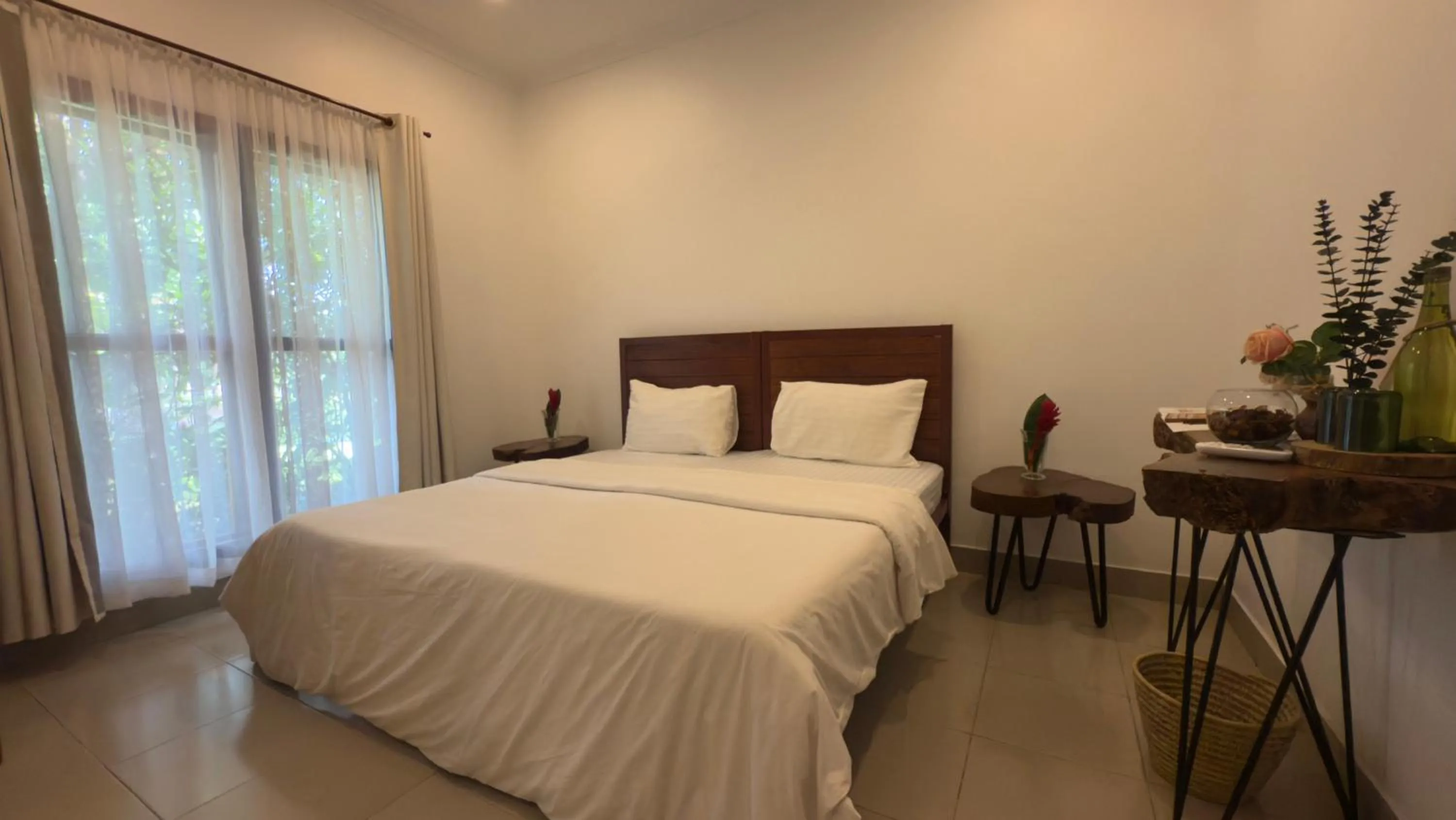 Bed in Tulivu Kilimanjaro Retreat