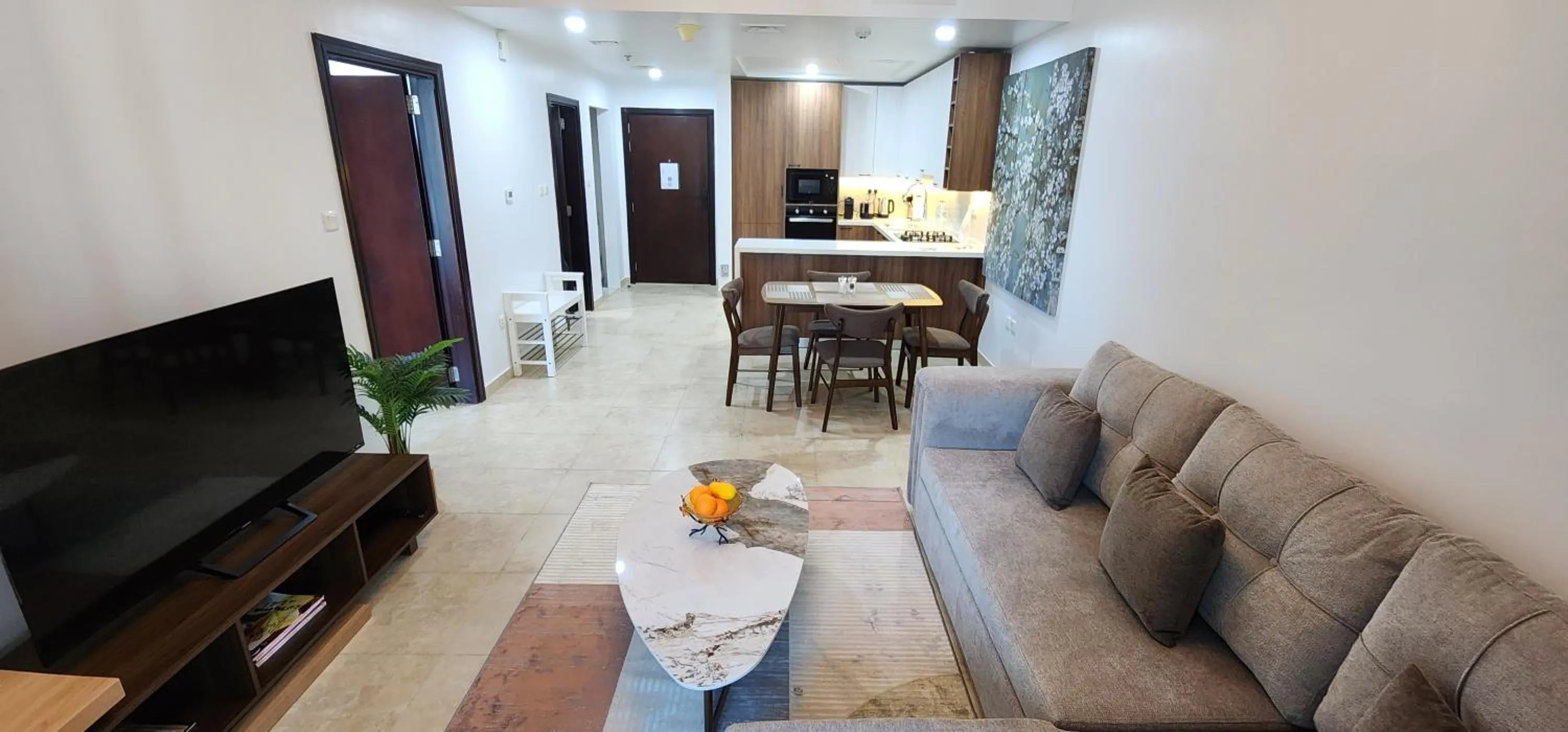 Communal lounge/ TV room in Preatoni Tower - JLT by Golden Casa