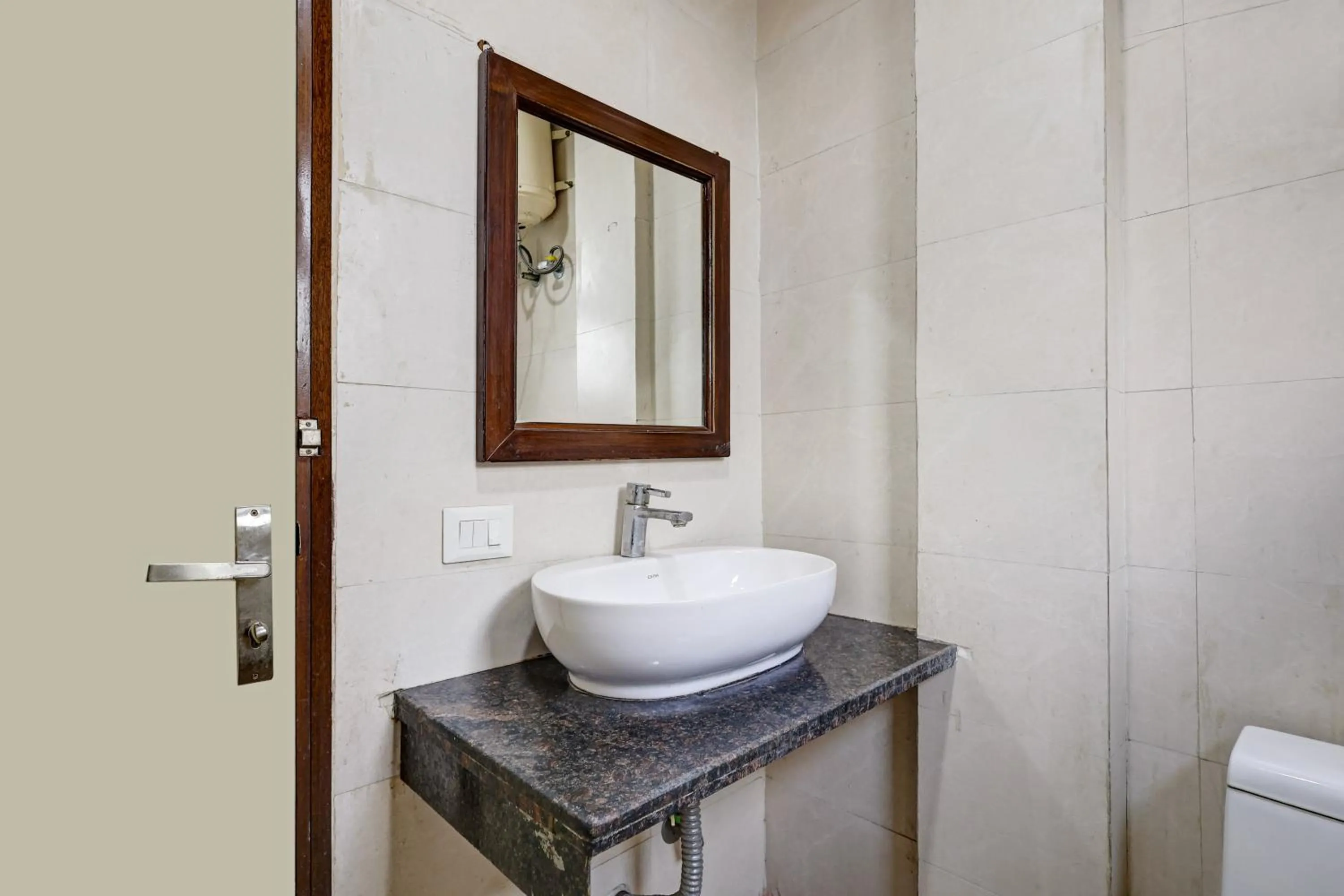 Toilet in Mauryan Elite Hotel Qutab Minar Metro Station