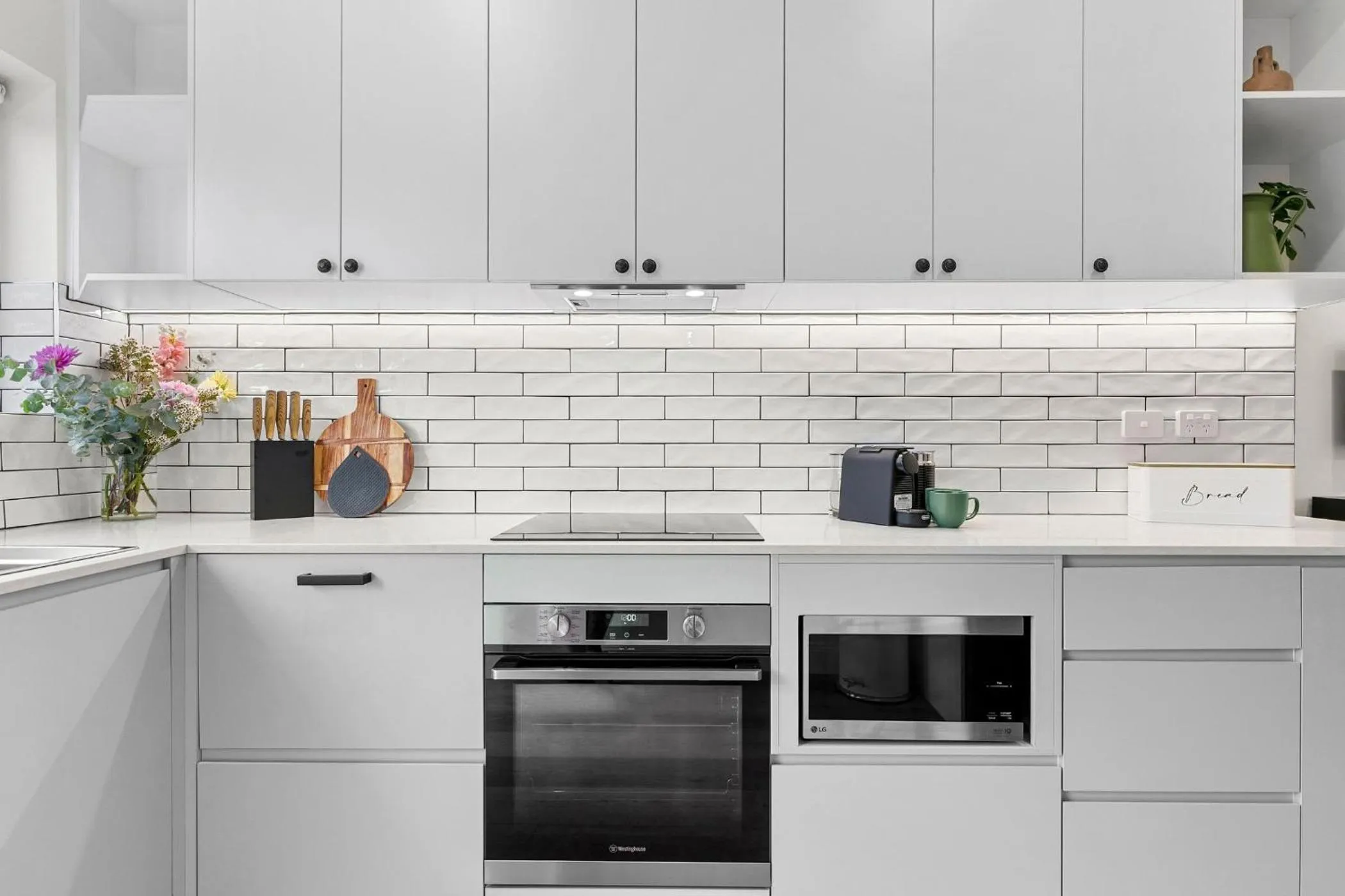 dishwasher in Hamilton Lodge Apartments by Urban Rest