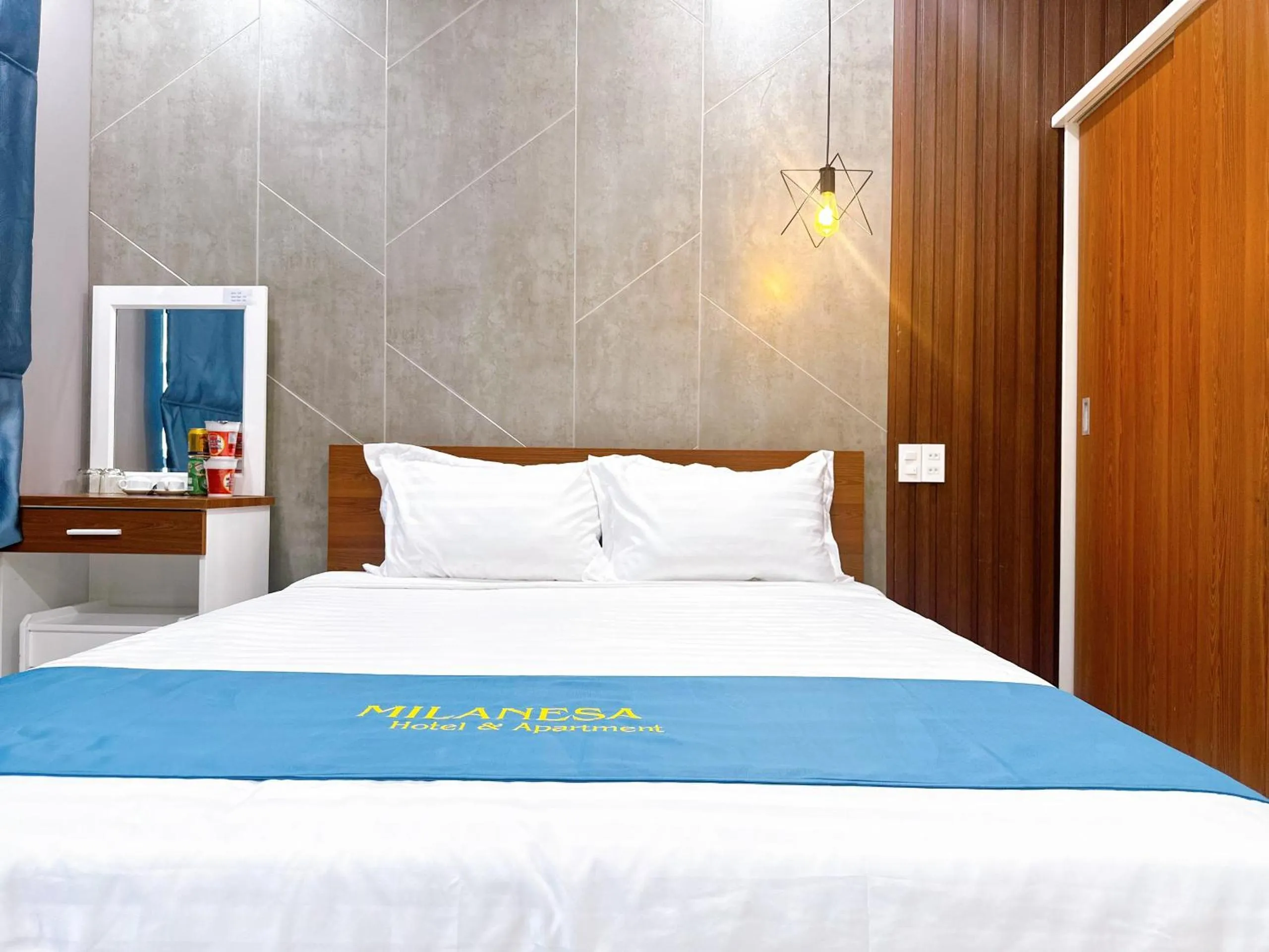 Bed in Milanesa Hotel and Apartment