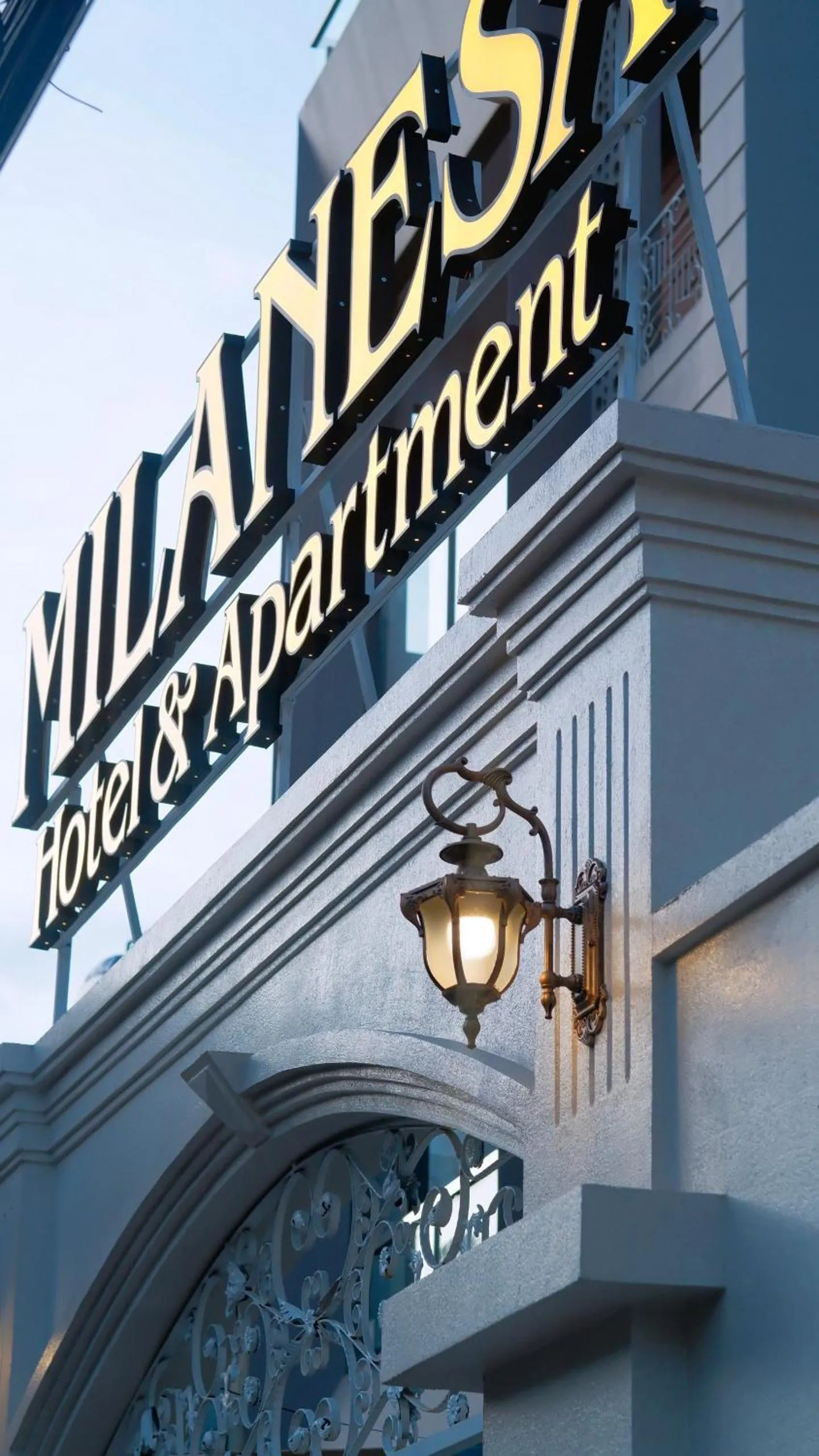 Property logo or sign in Milanesa Hotel and Apartment