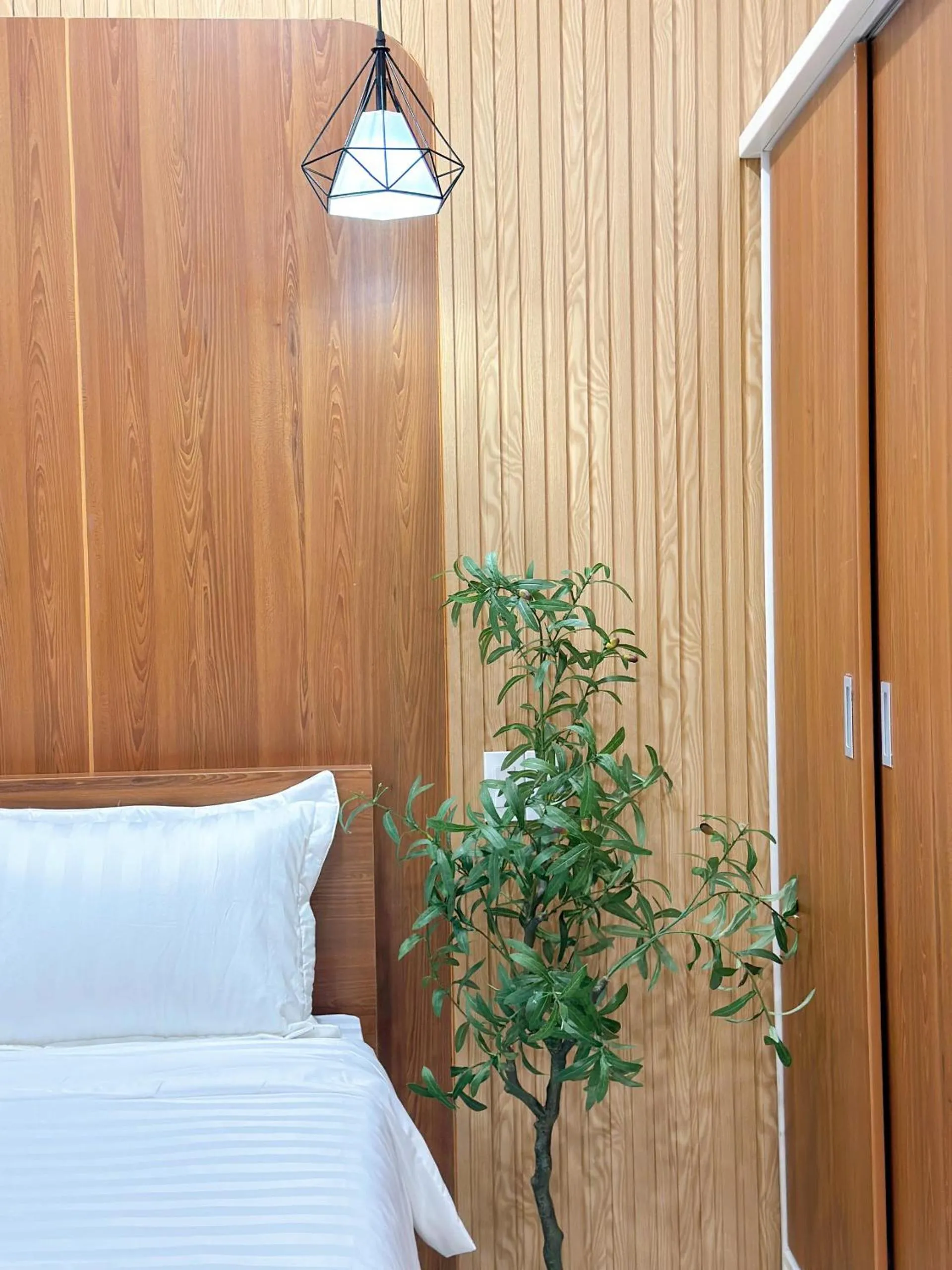 Bed in Milanesa Hotel and Apartment