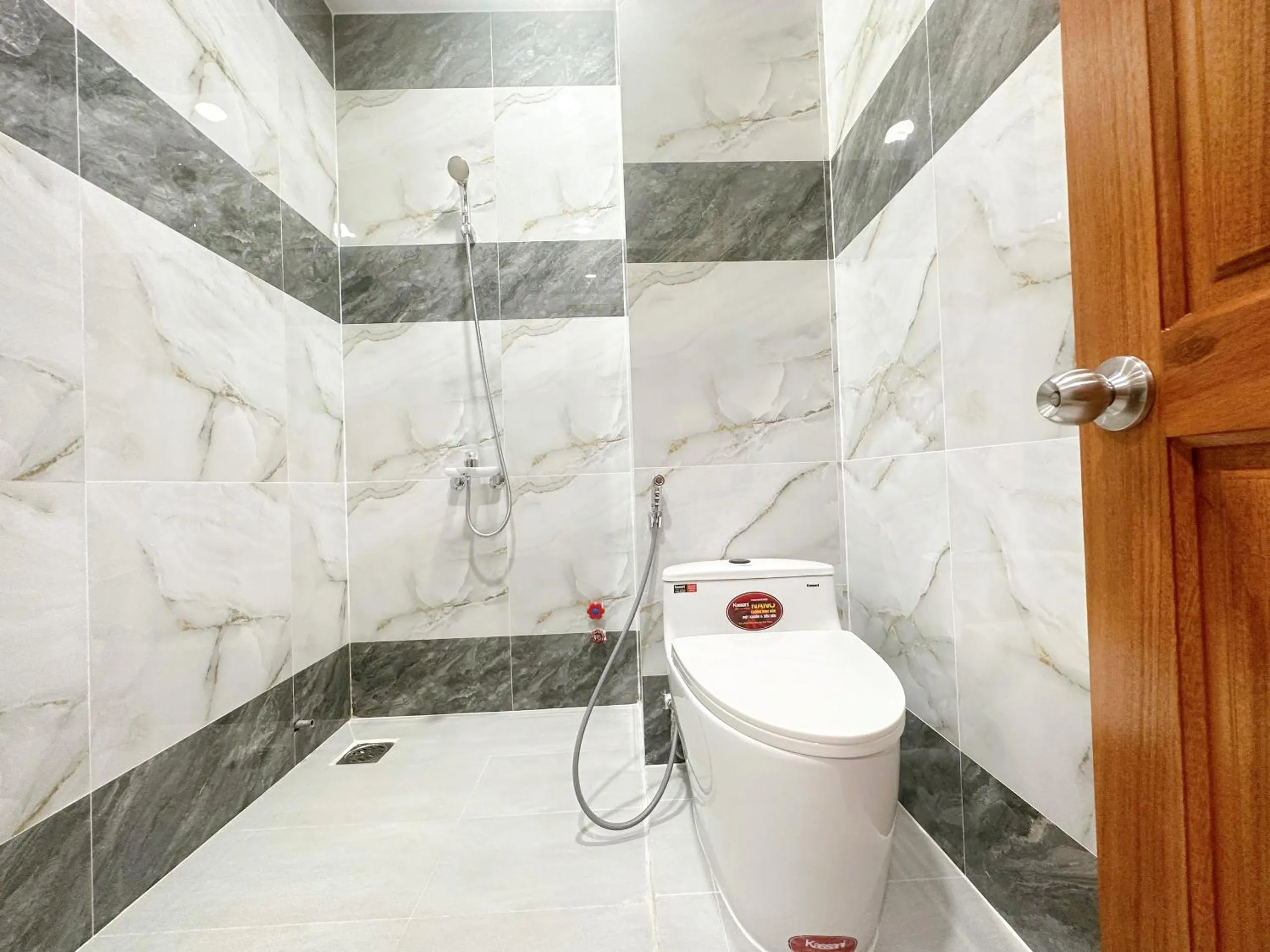 Toilet in Milanesa Hotel and Apartment