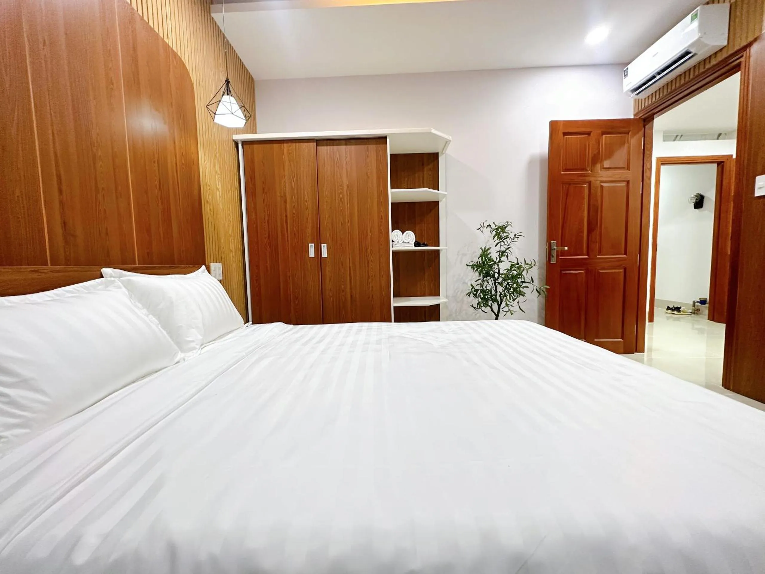 Bed in Milanesa Hotel and Apartment