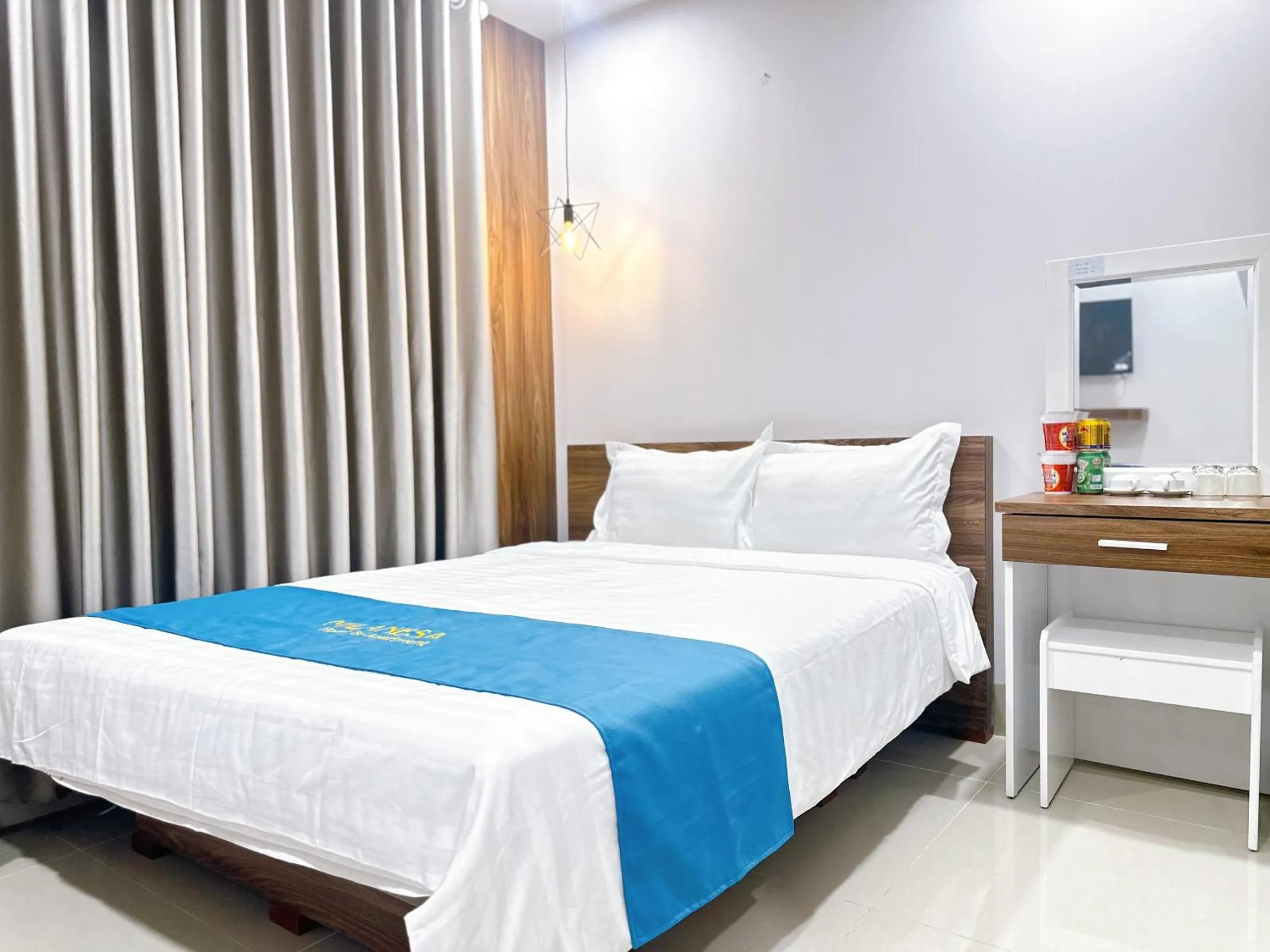 Bed in Milanesa Hotel and Apartment