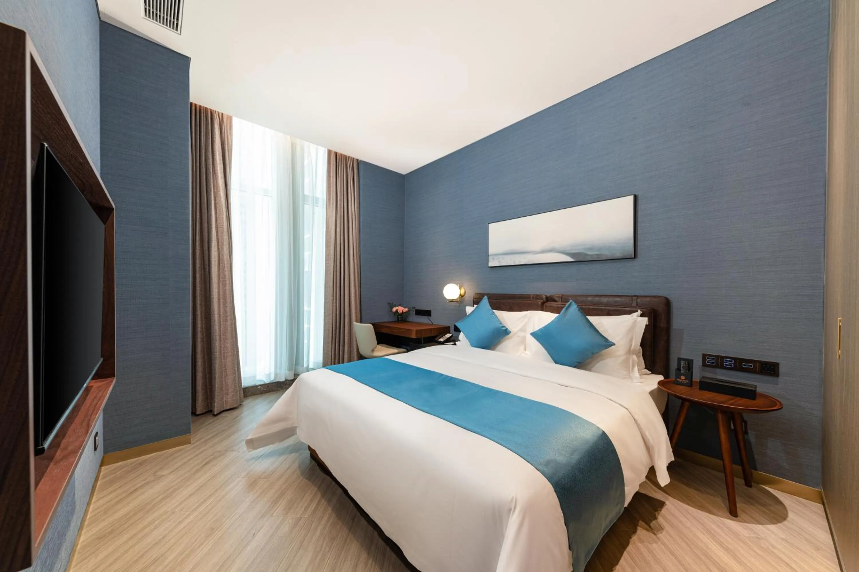 Bed in Shan Zhi Ye Serviced Apartment Hotel - Houjie Wanda Plaza Liaoxia Subway Station