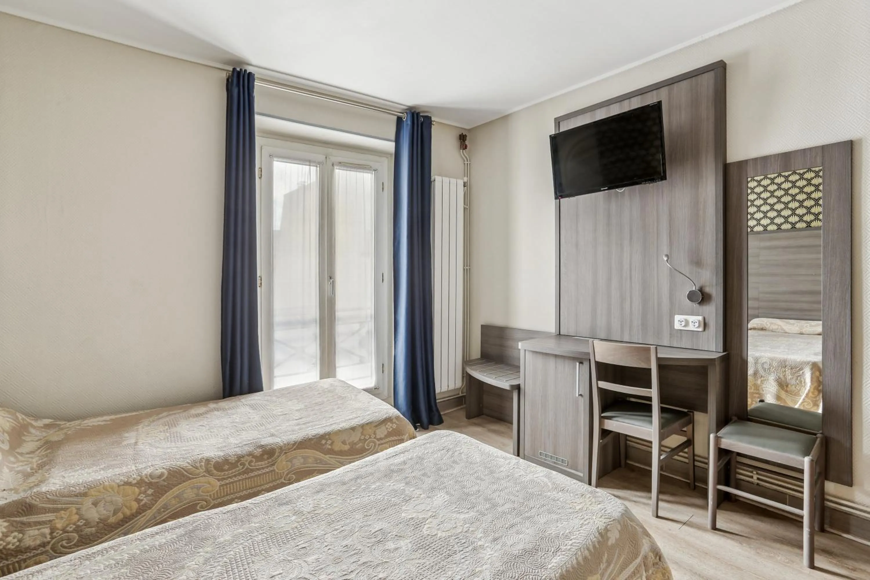 Bed in Hotel Telemaque