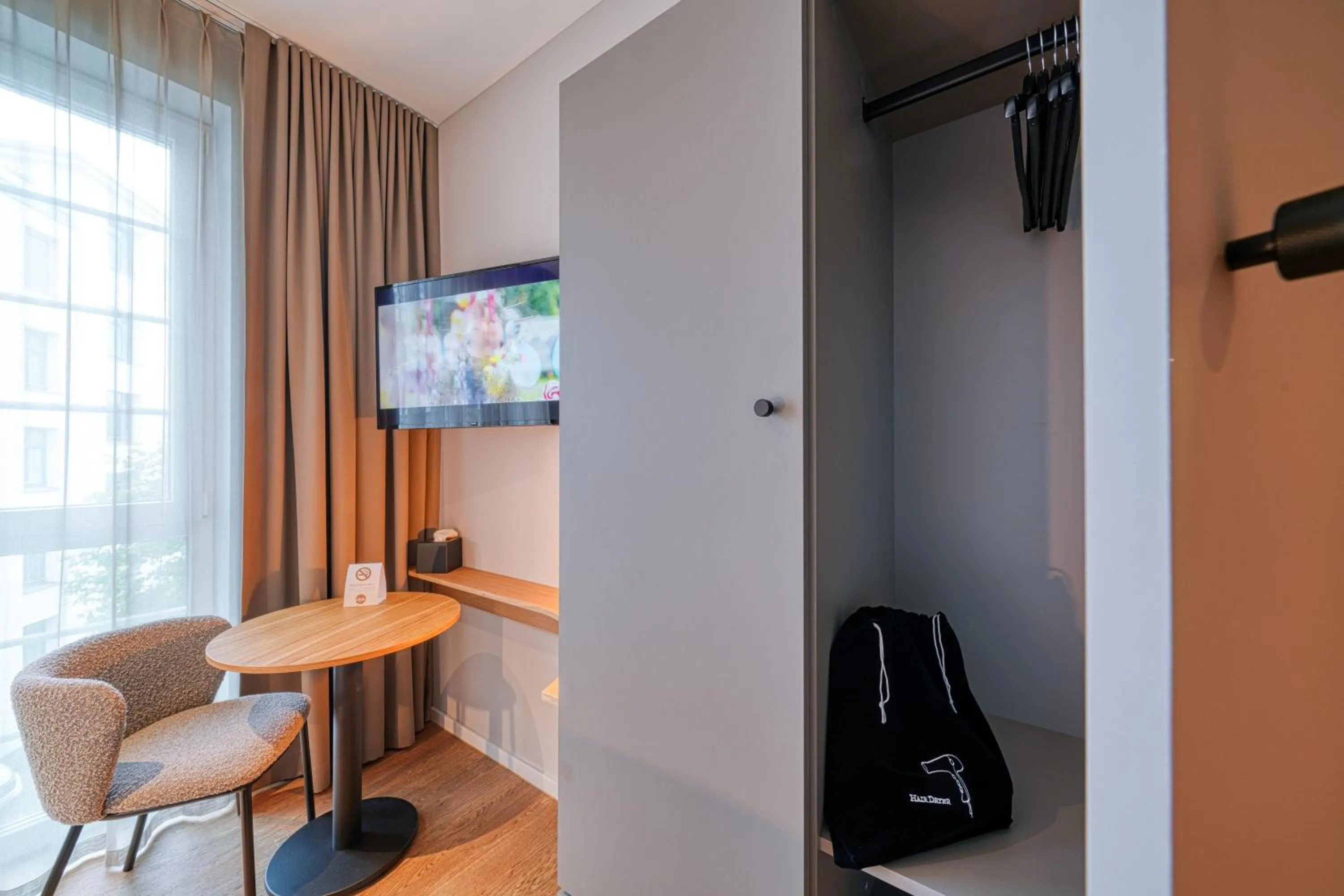 Seating area in INA Boutique Hannover-Linden - Digital Access