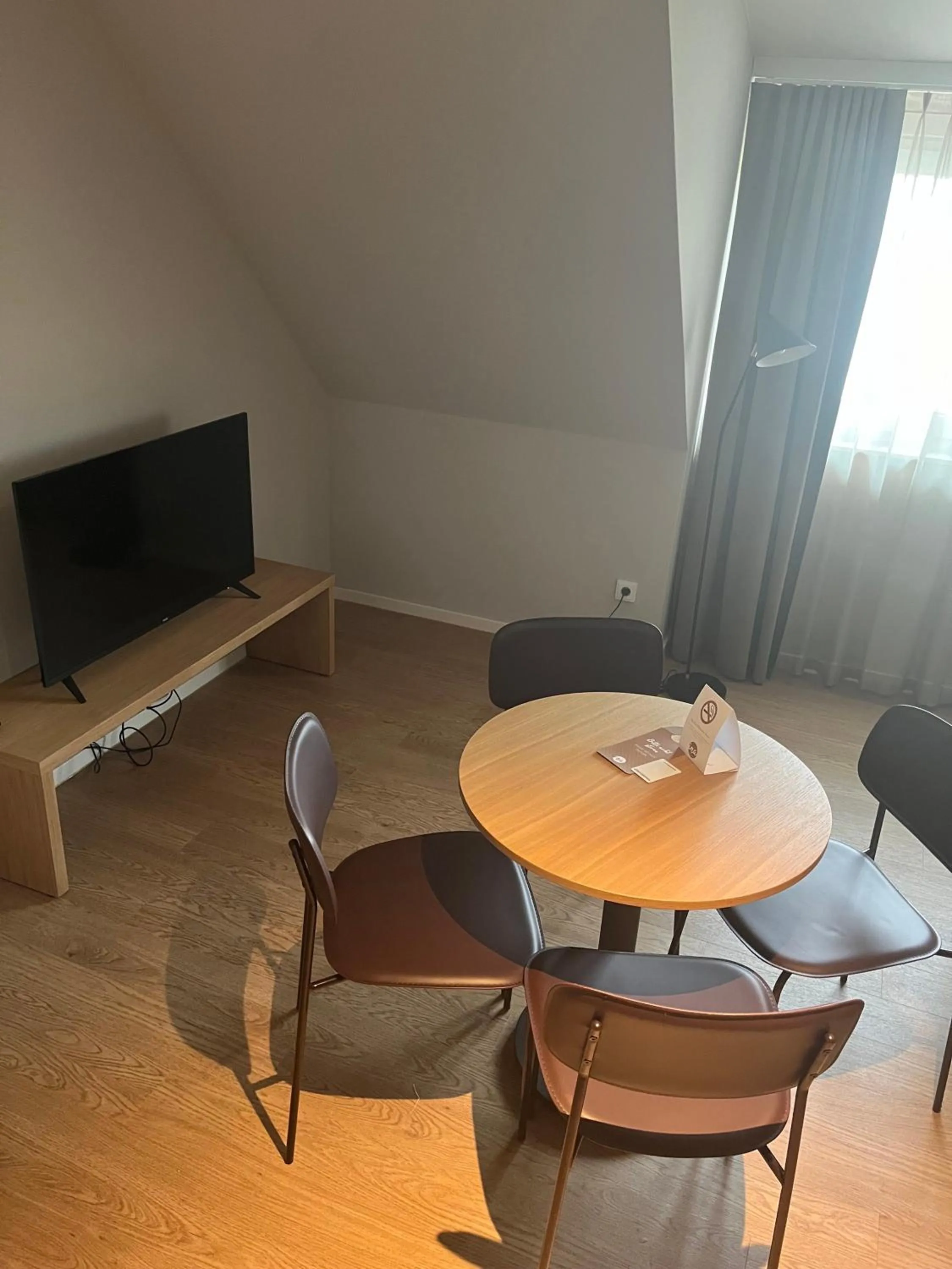 Seating area in INA Boutique Hannover-Linden - Digital Access