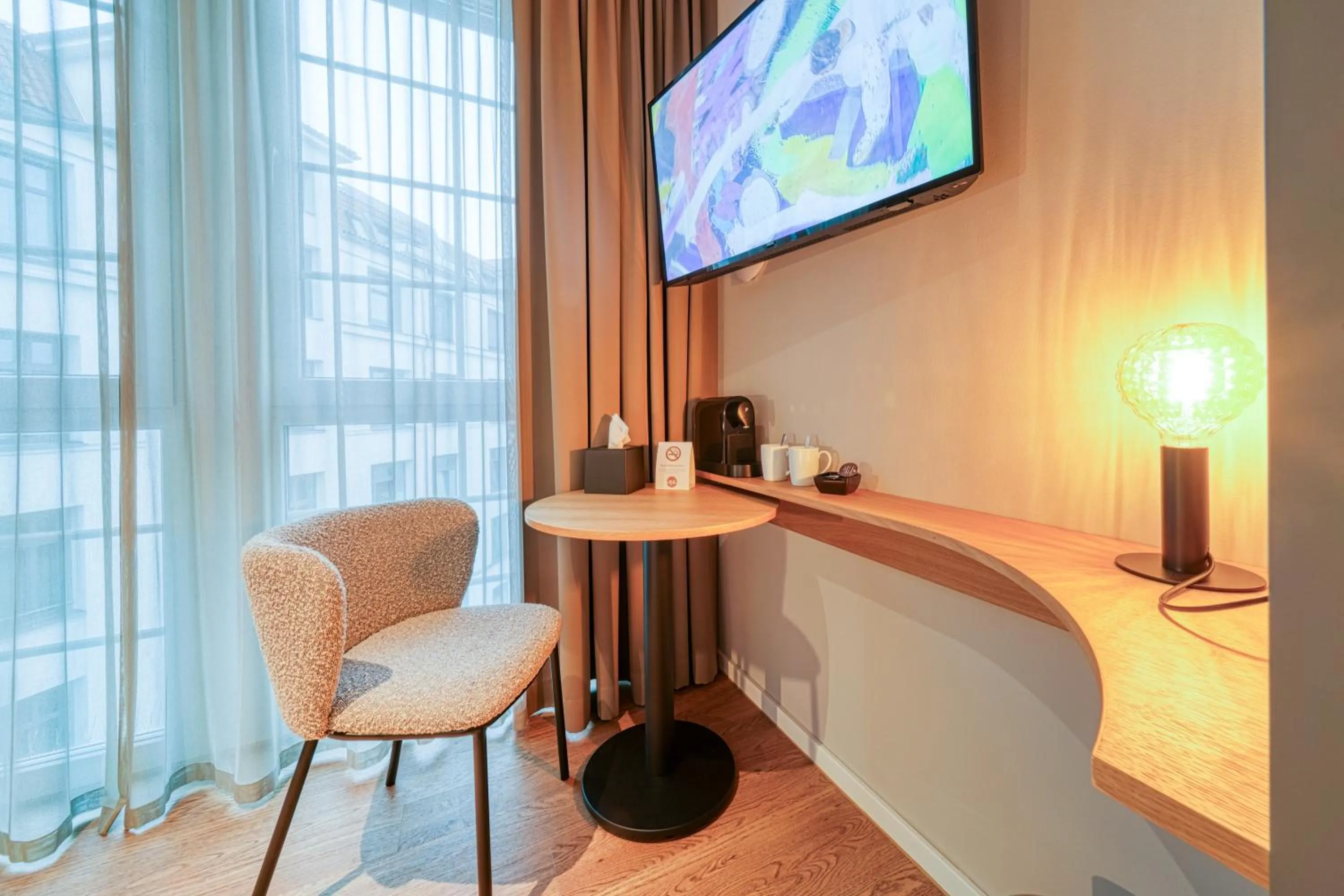 Seating area in INA Boutique Hannover-Linden - Digital Access