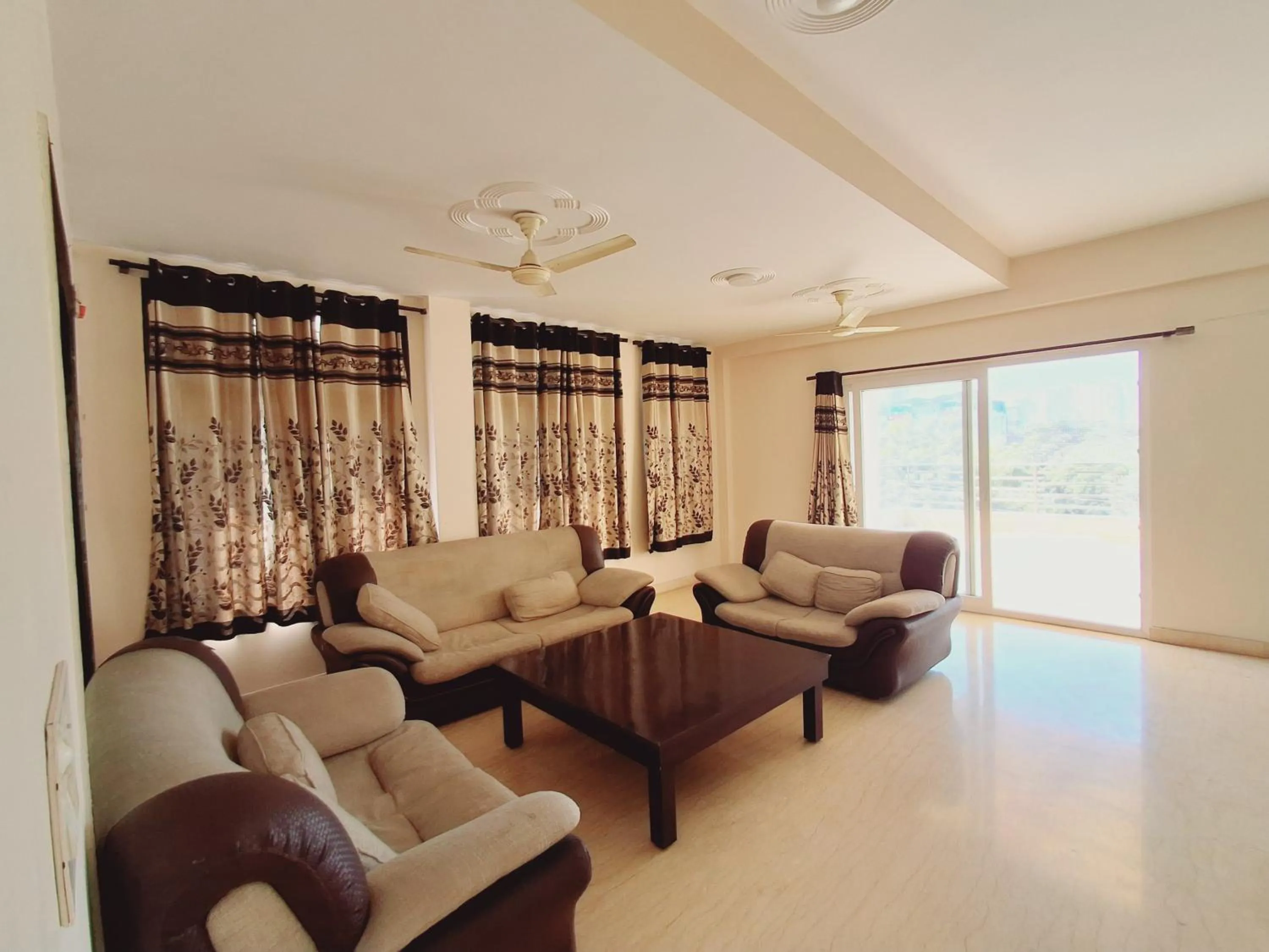 Living room in NICE Stay & Care