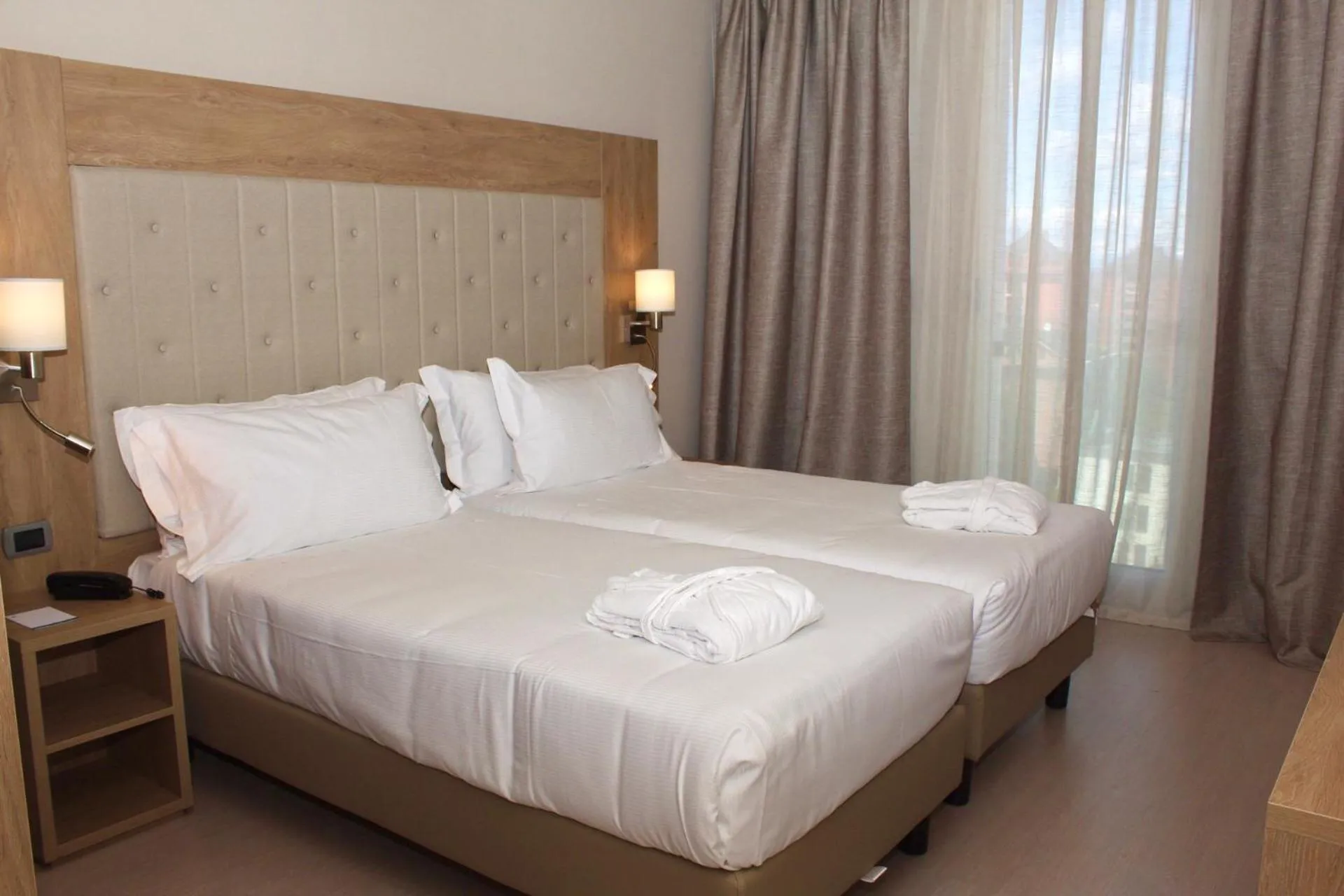 Bed in Tower Hotel Malpensa