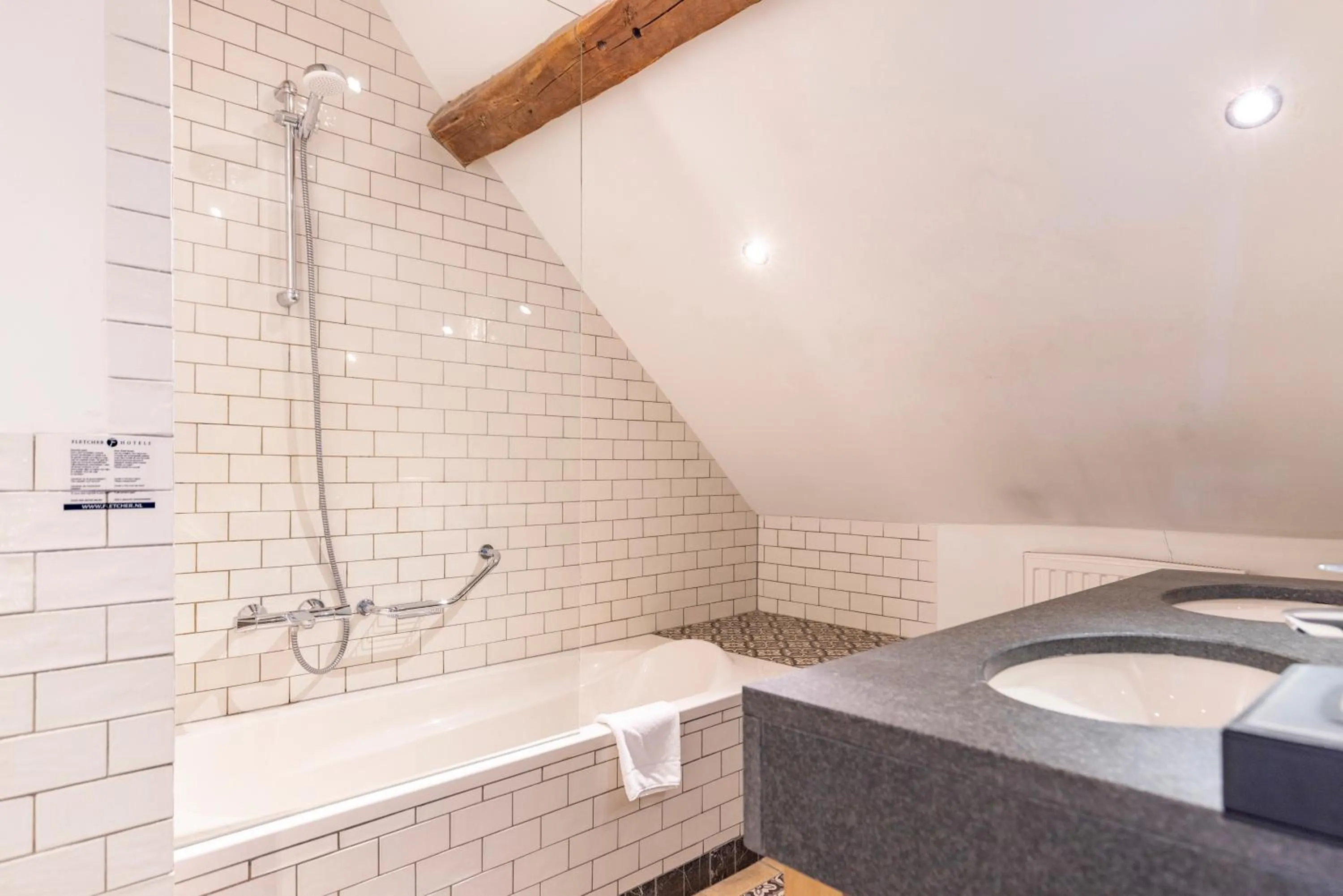 Bathroom in Fletcher Hotel Château De Raay