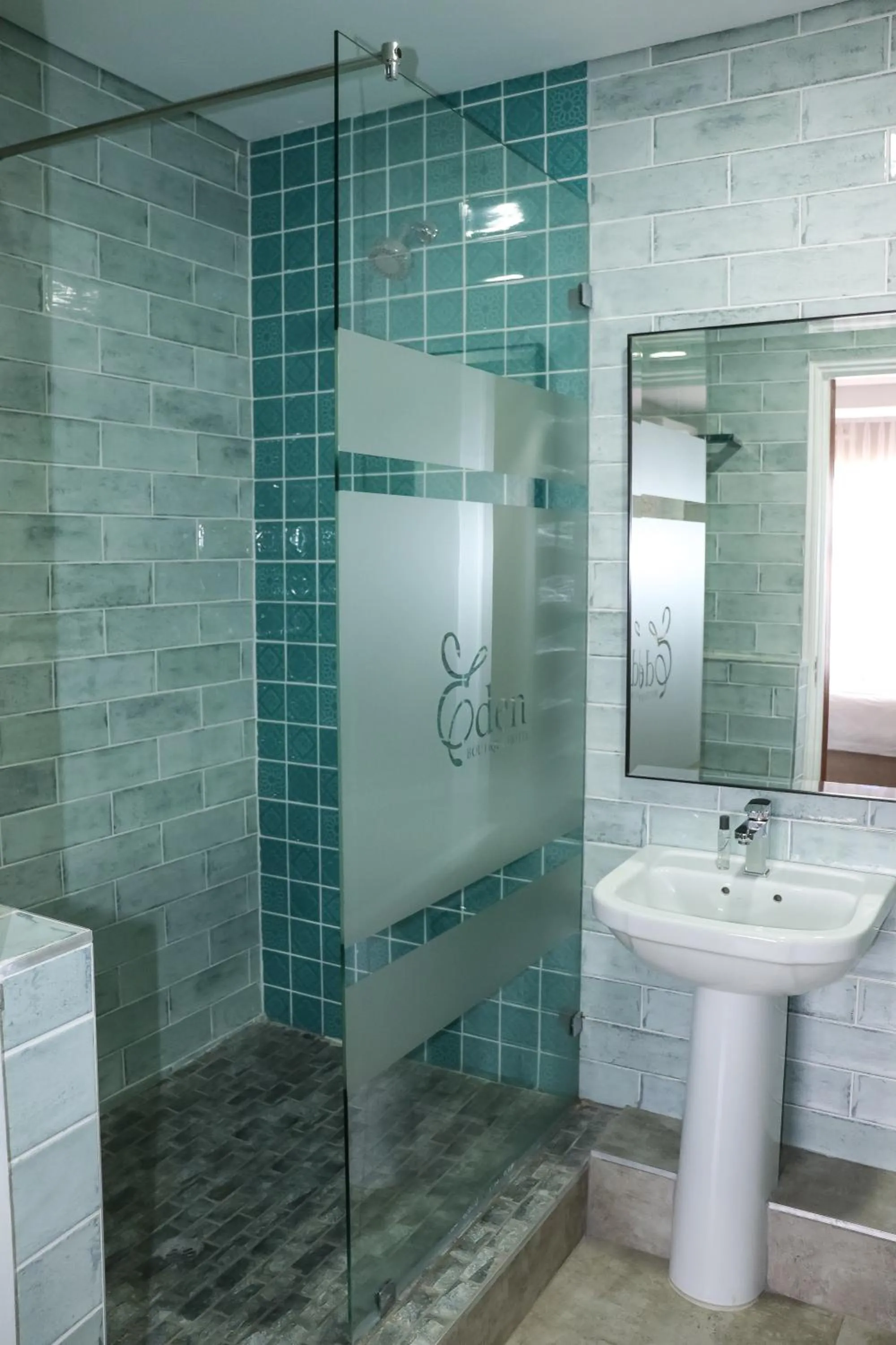 Shower in EDEN BOUTIQUE HOTEL