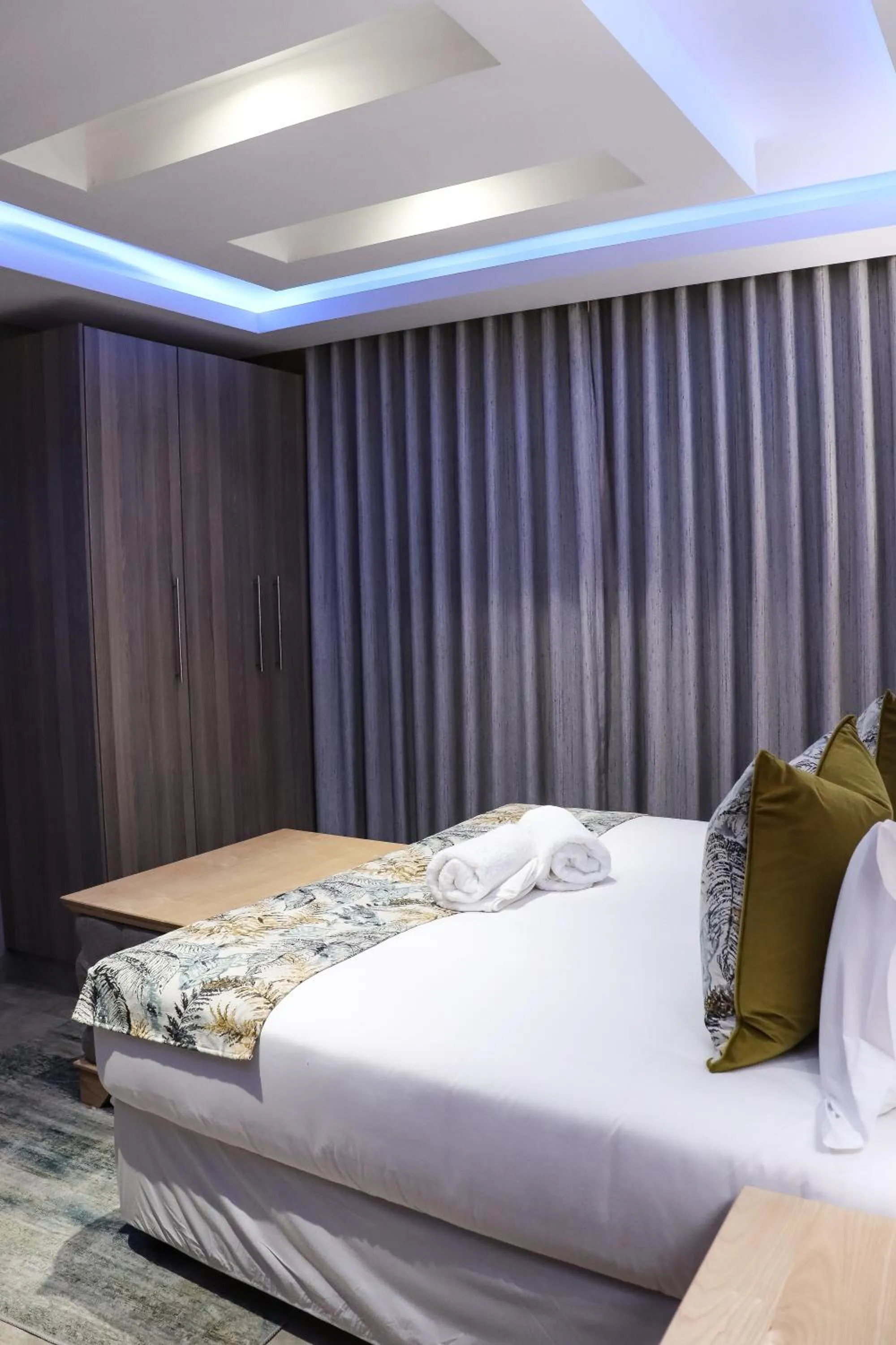 Bed in EDEN BOUTIQUE HOTEL