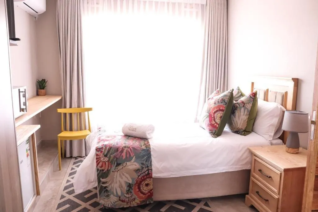 Bed in EDEN BOUTIQUE HOTEL