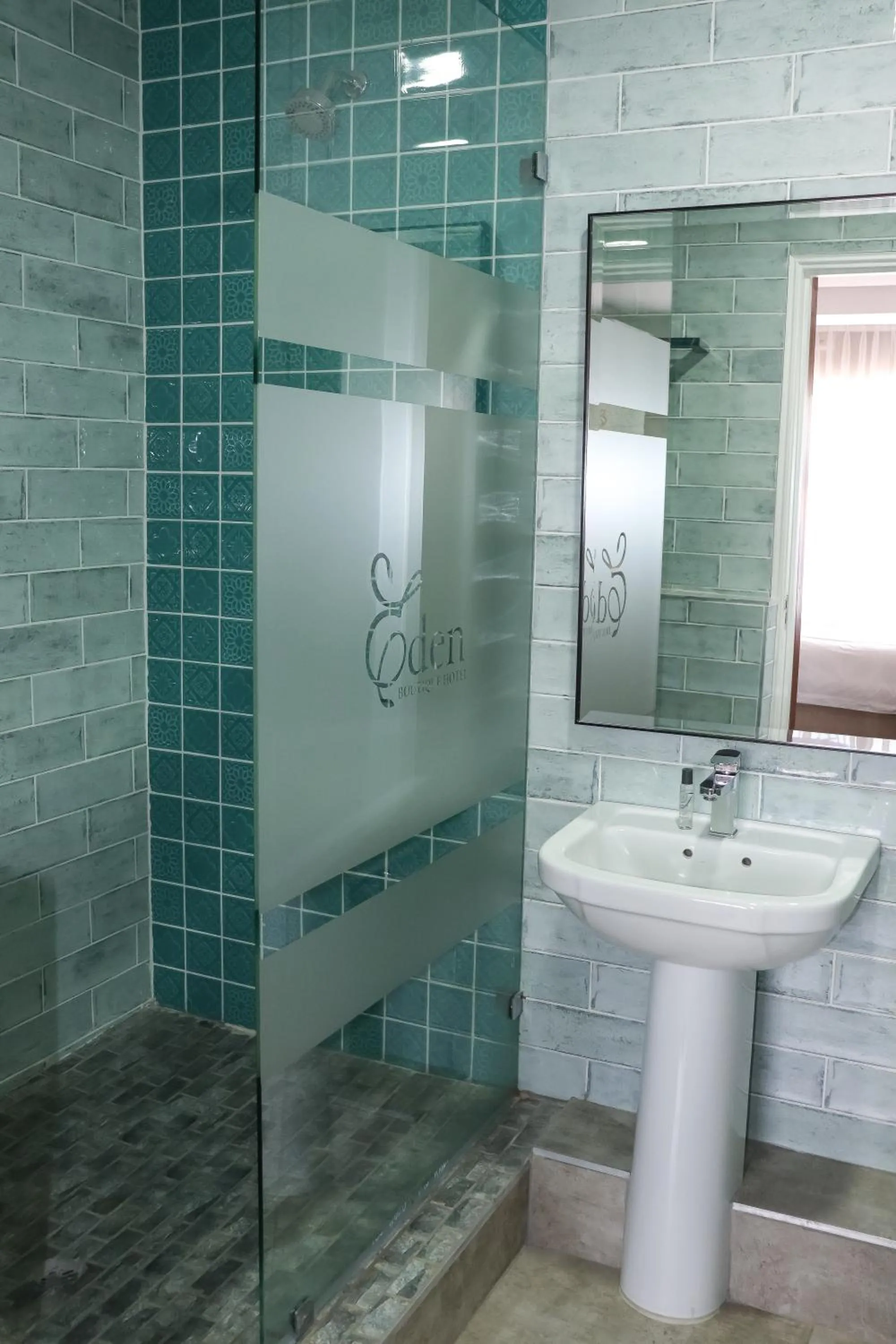 Shower in EDEN BOUTIQUE HOTEL