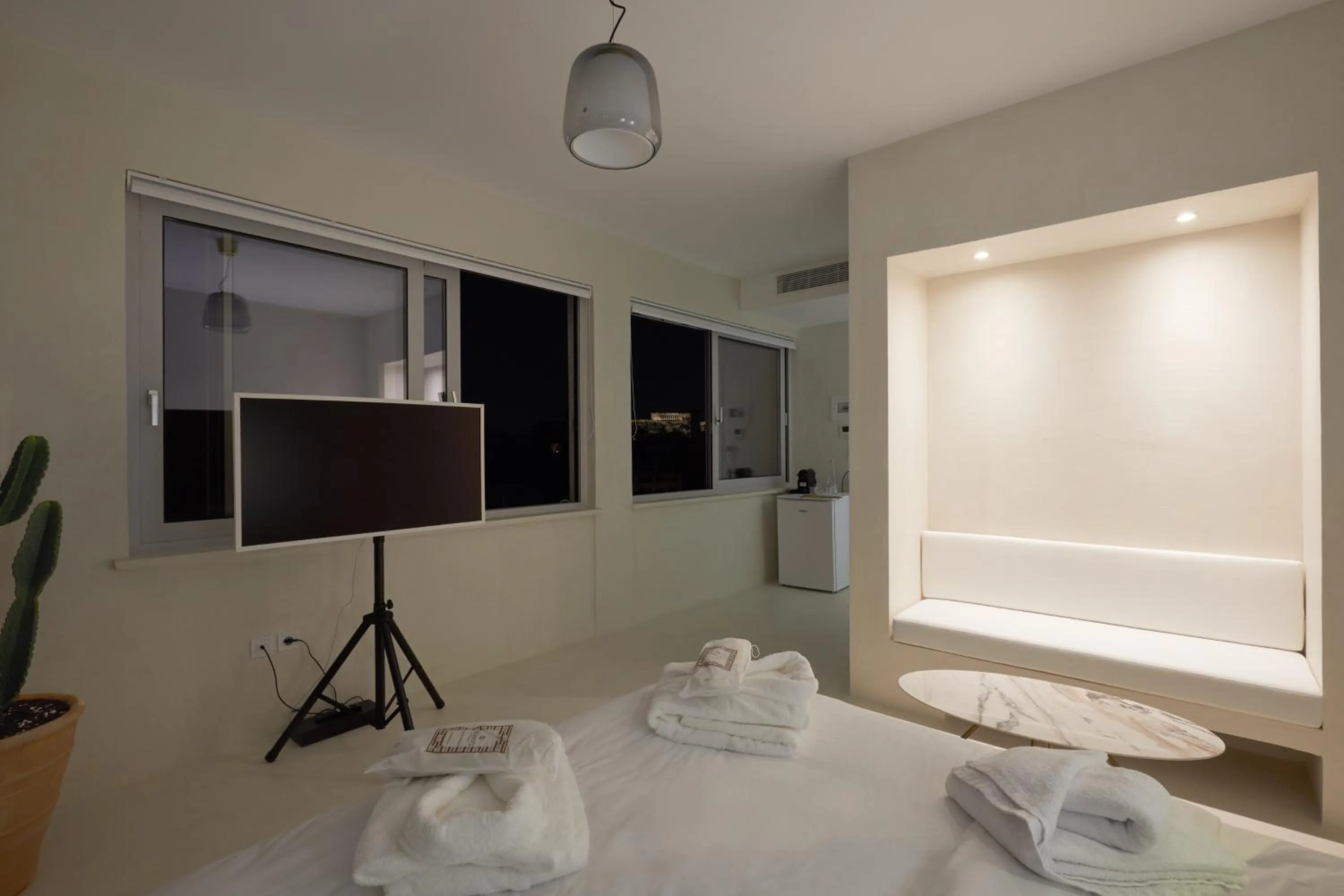 Seating area, Bed in Athens Penthouse