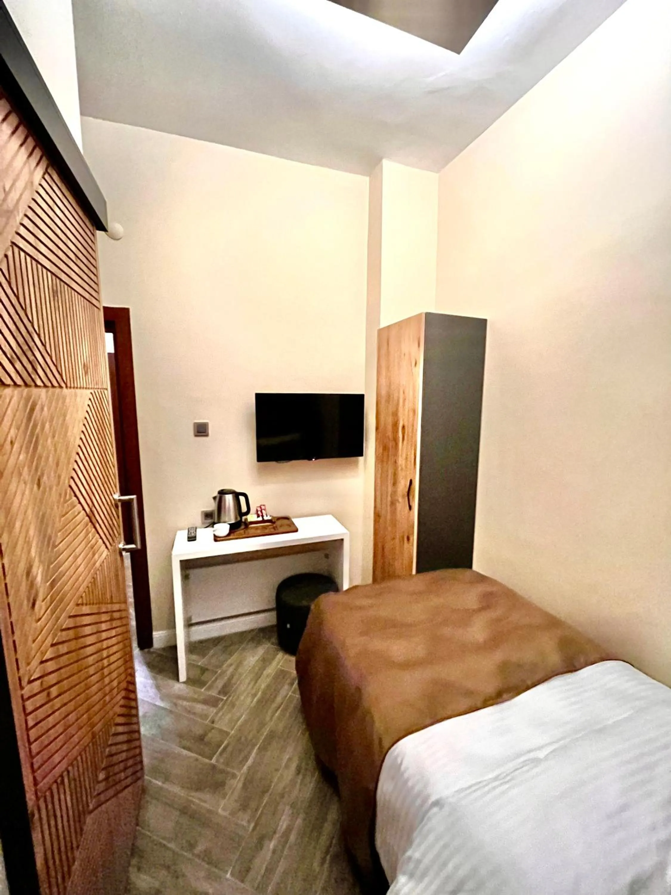 Bed in Miro Mara Boutique Hotel & Lounge Bar