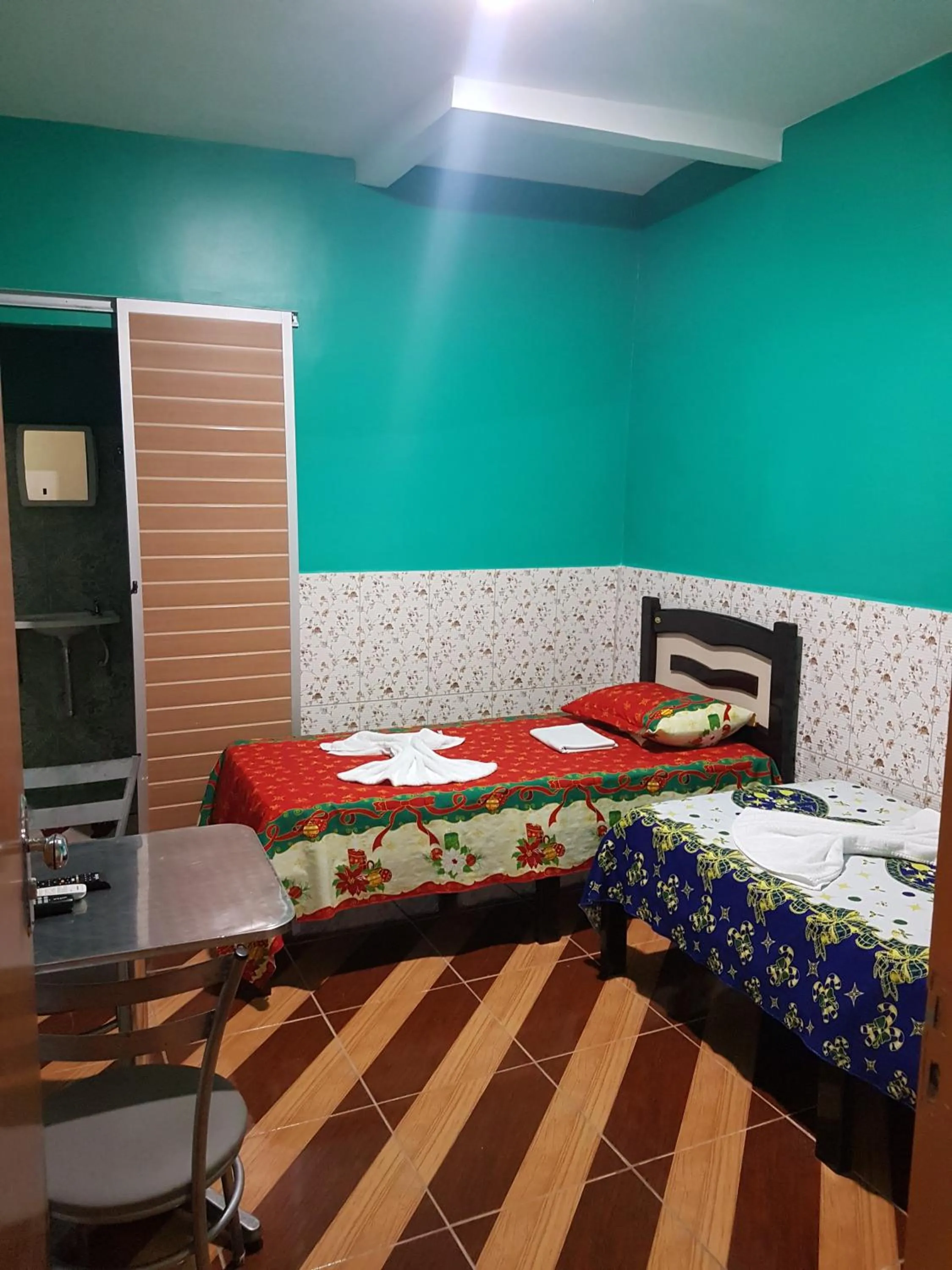 Bed in Pousada Pouso Feliz