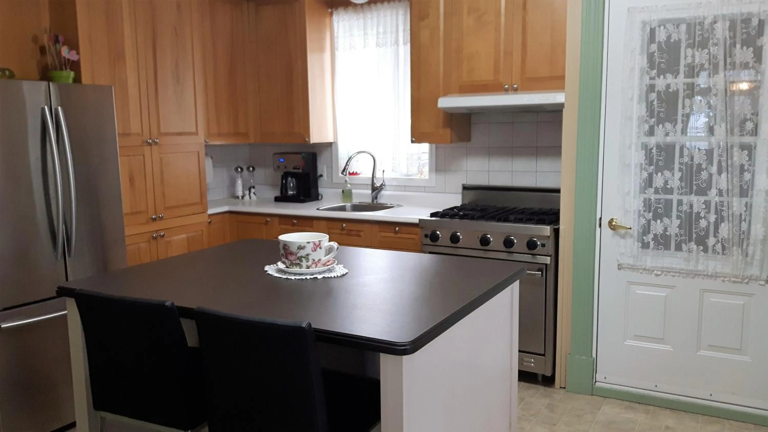 Kitchen or kitchenette in auberge gite maison des lilas