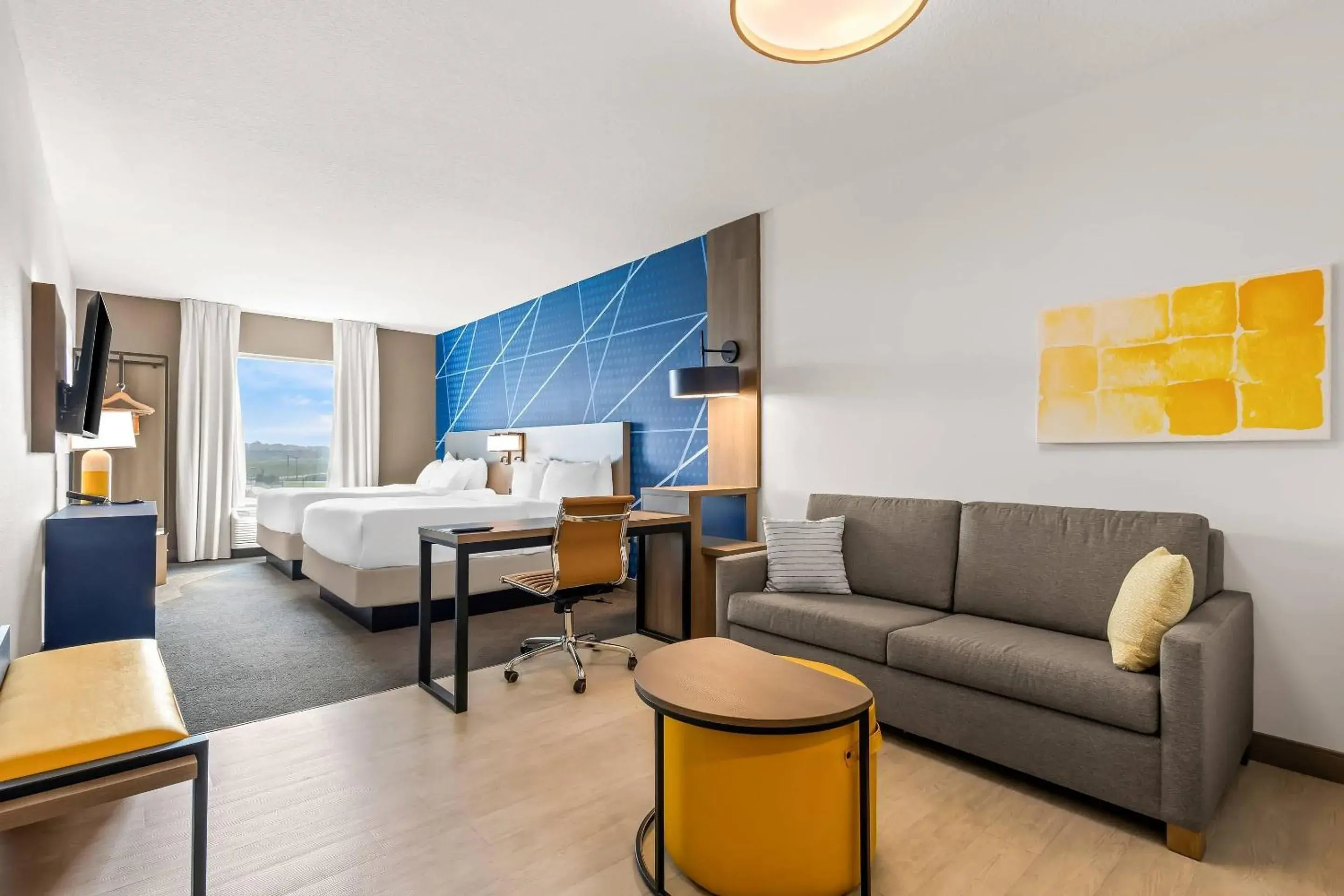 Family Room with Two Queen Beds and Sofa bed - Disability Access/Non Smoking/Interior Hall in Comfort Inn & Suites at Sanford Sports Complex Family Room with Two Queen Beds and Sofa bed - Disability Access/Non Smoking/Interior Hall in Comfort Inn & Suites at Sanford Sports Complex