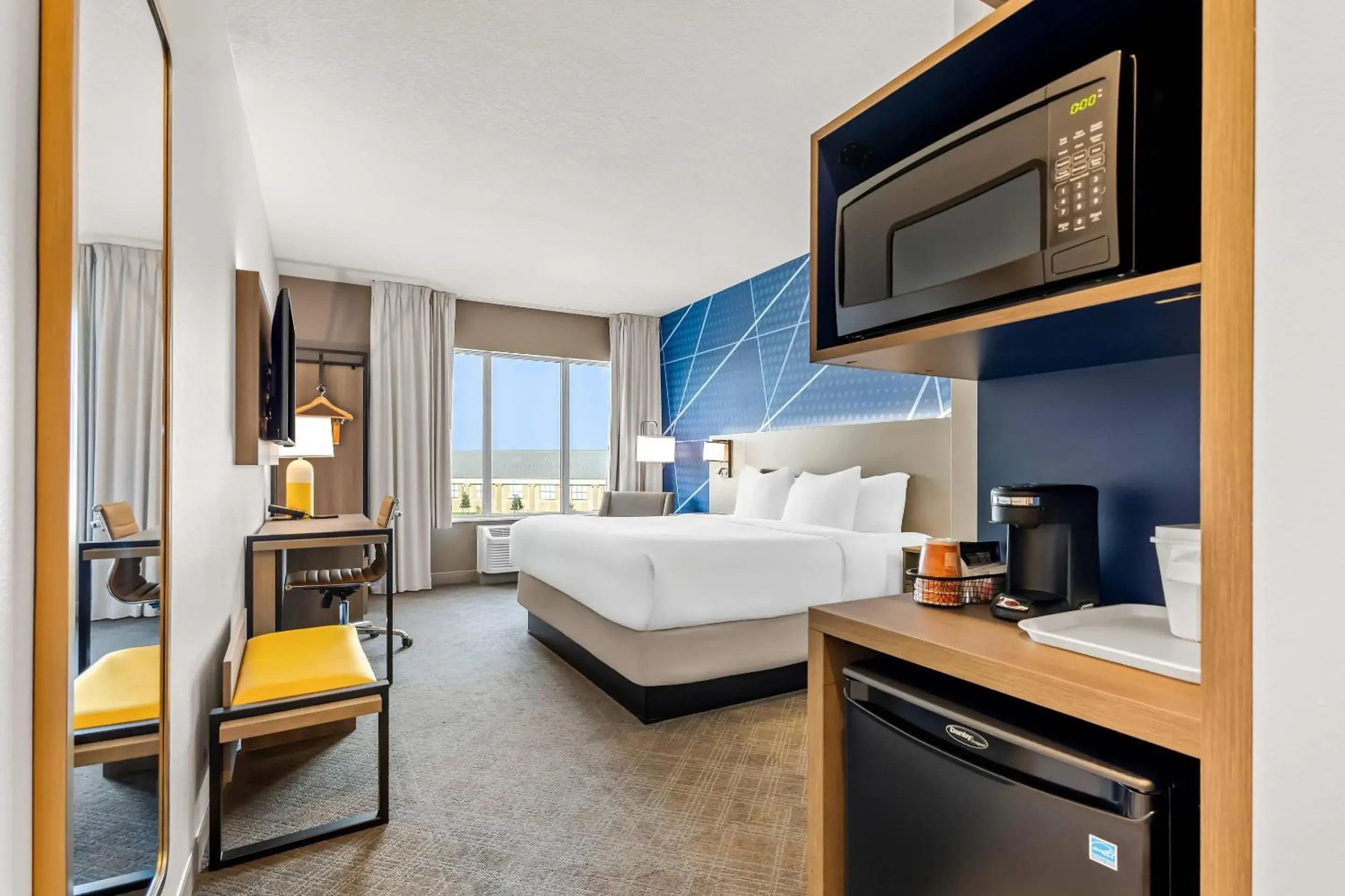 King Room - Non Smoking/Interior Hall in Comfort Inn & Suites at Sanford Sports Complex King Room - Non Smoking/Interior Hall in Comfort Inn & Suites at Sanford Sports Complex