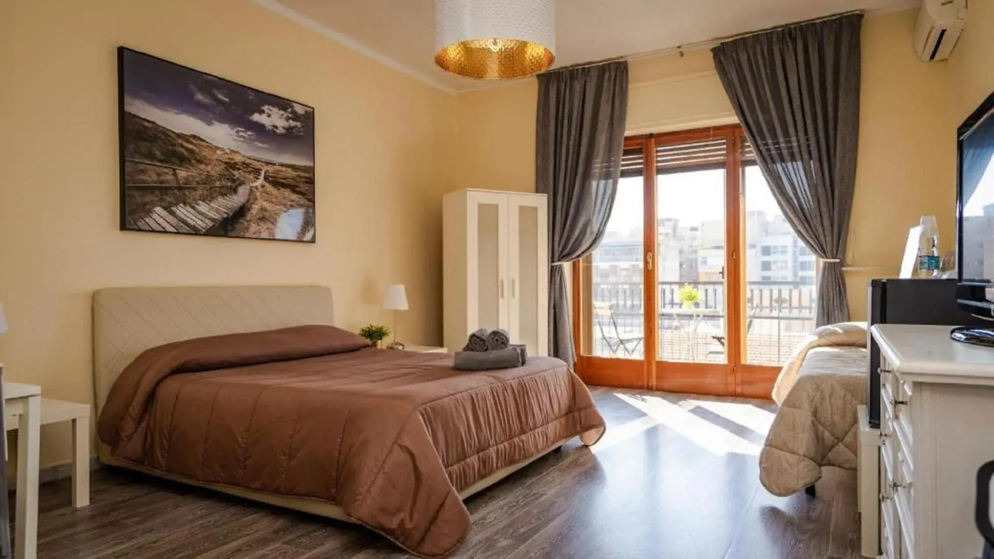 Quadruple Room with Terrace - single occupancy in CconfortHotels Semplici Emozioni Quadruple Room with Terrace - single occupancy in CconfortHotels Semplici Emozioni