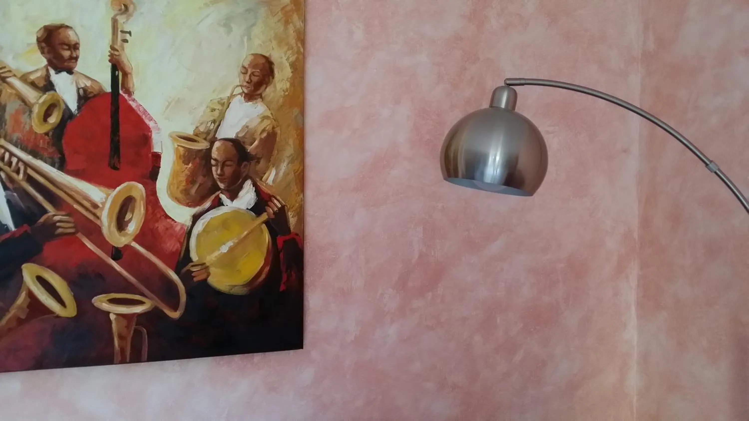 Communal lounge/ TV room in B&B il Tulipano