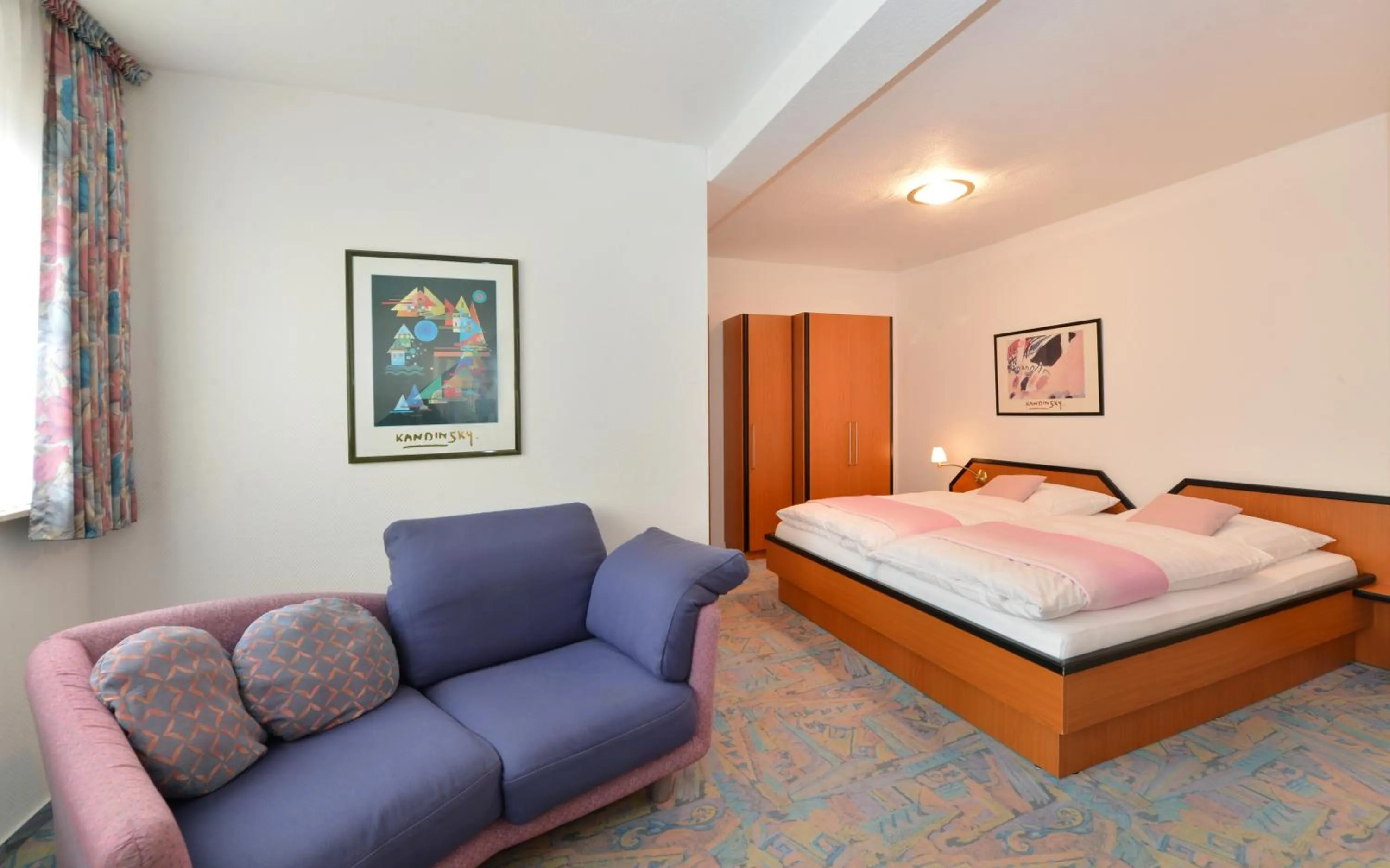 Seating area, Bed in Rhön-Hotel Sonnenhof - Restaurant & Café