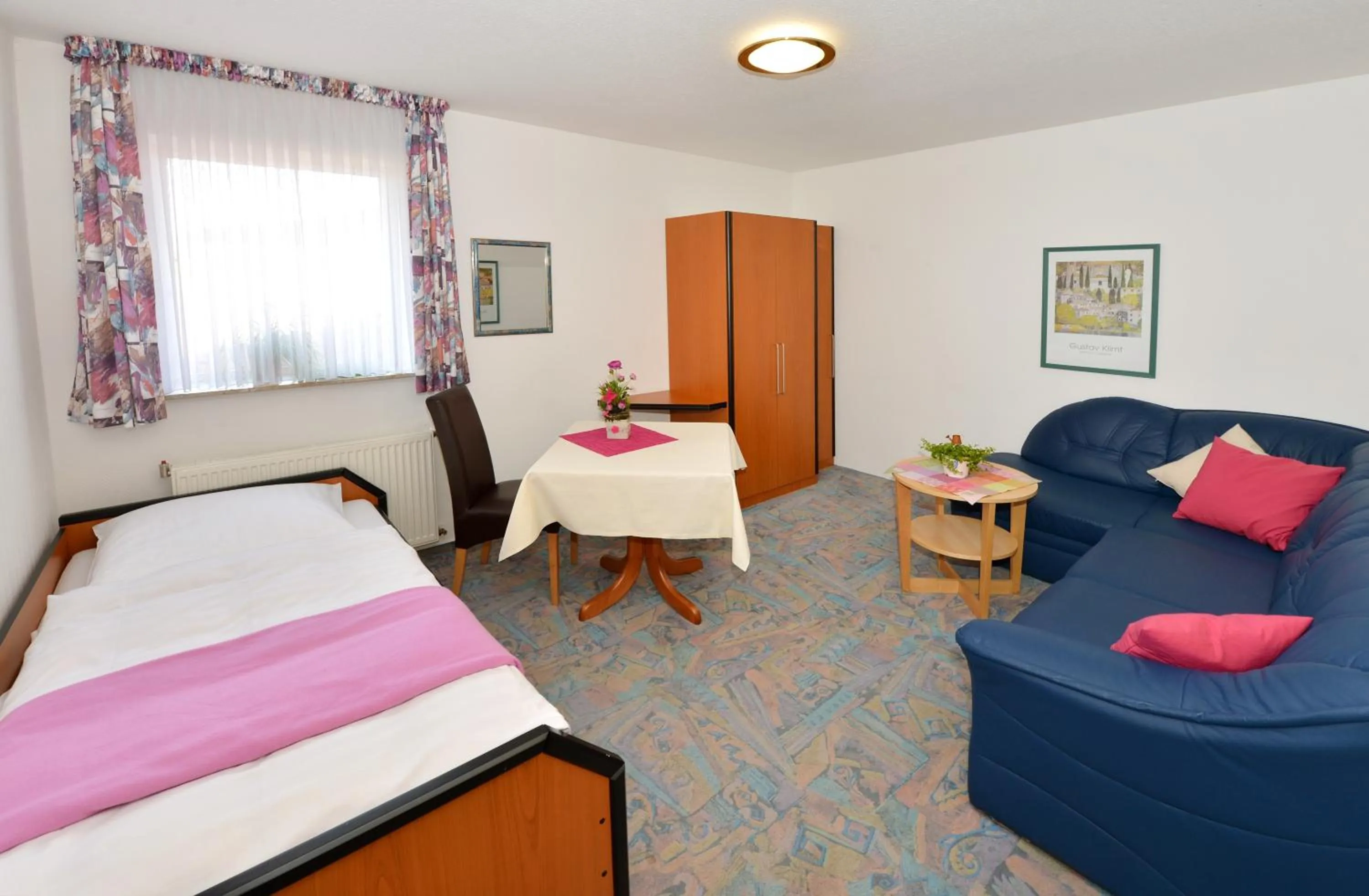 Seating area, Bed in Rhön-Hotel Sonnenhof - Restaurant & Café