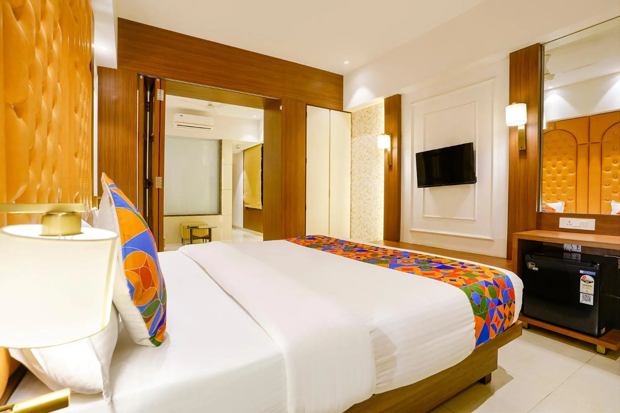Bed in FabHotel Prime Shubham Comforts