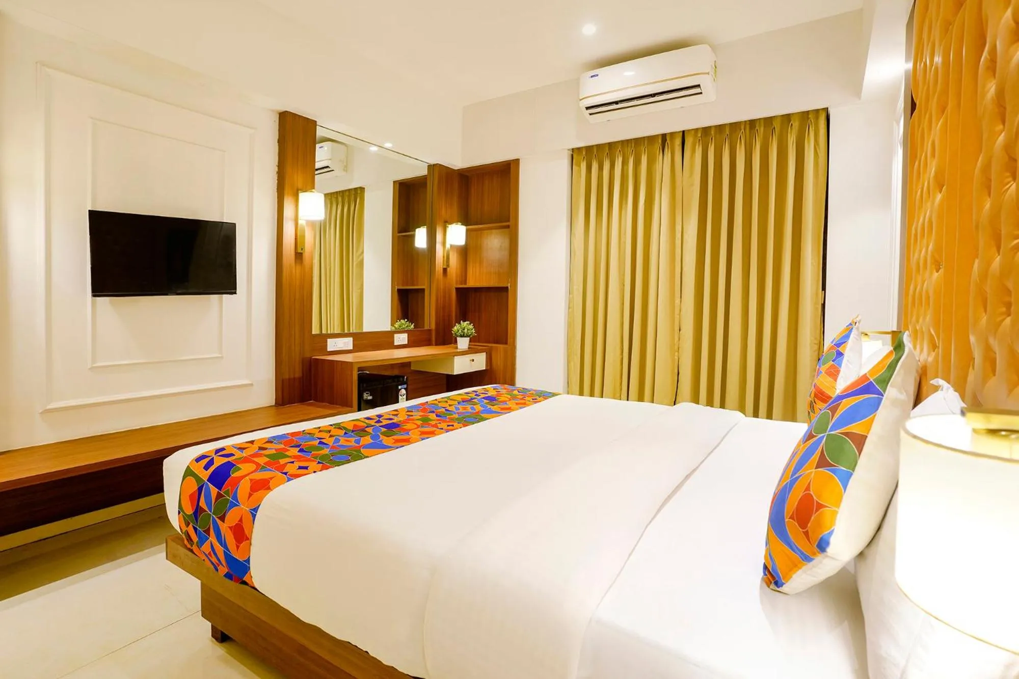 Bed in FabHotel Prime Shubham Comforts