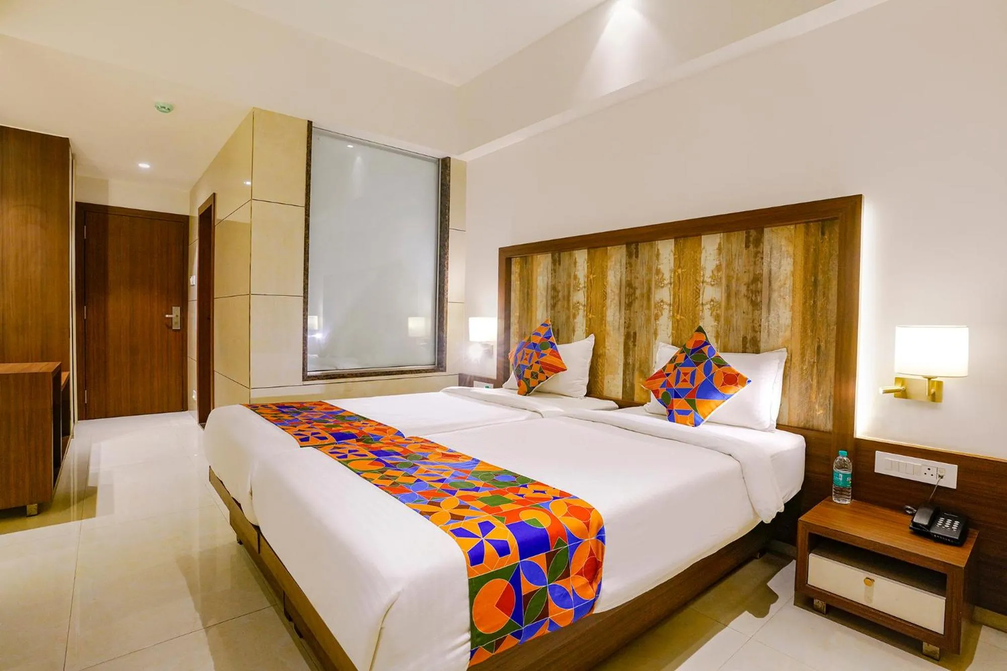 Bed in FabHotel Prime Shubham Comforts