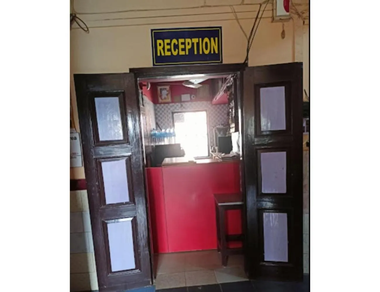 Text overlay in Central Guest House, Tripura