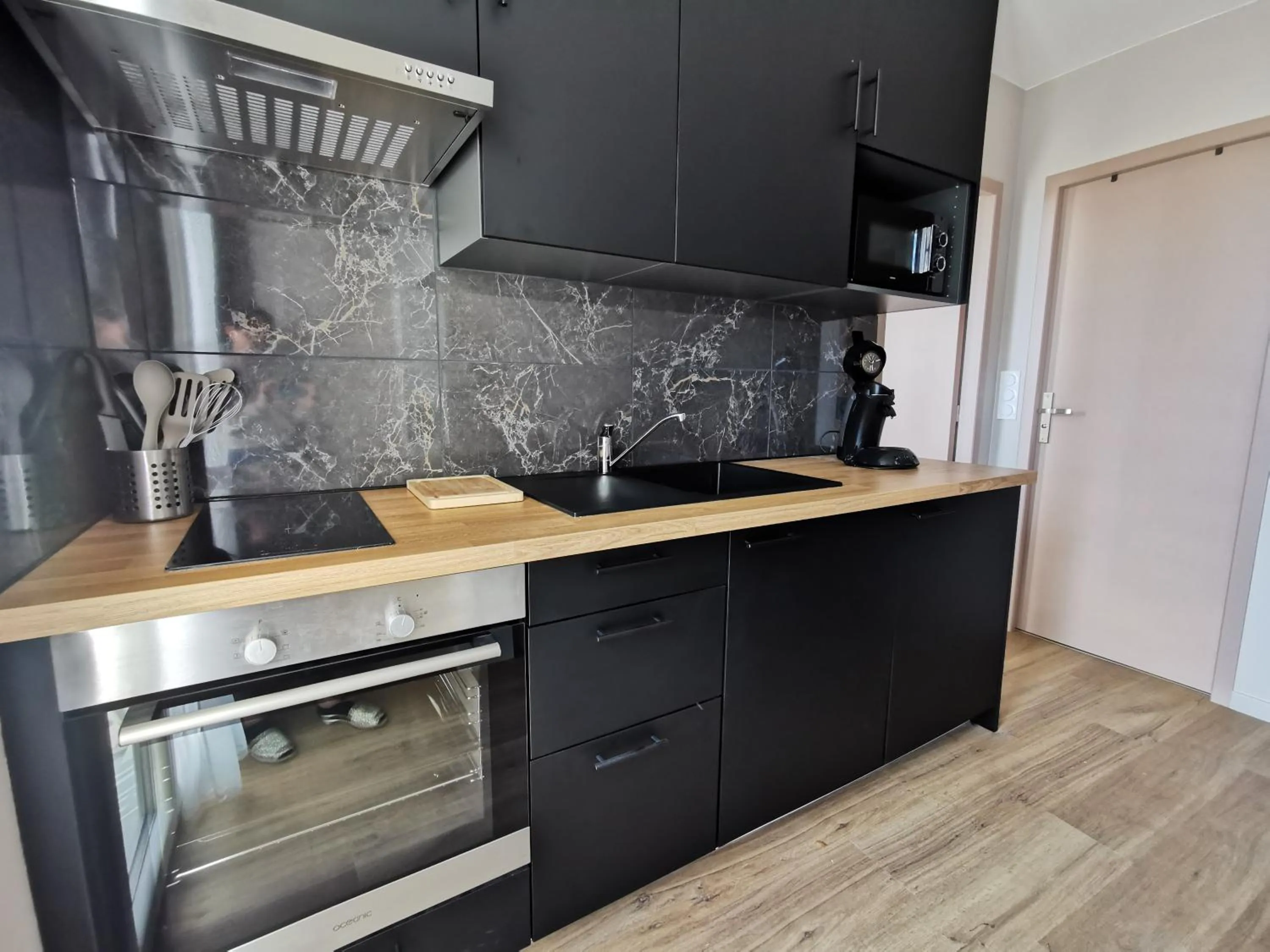 Kitchen or kitchenette in Appart Hotel Cinéma Perpignan