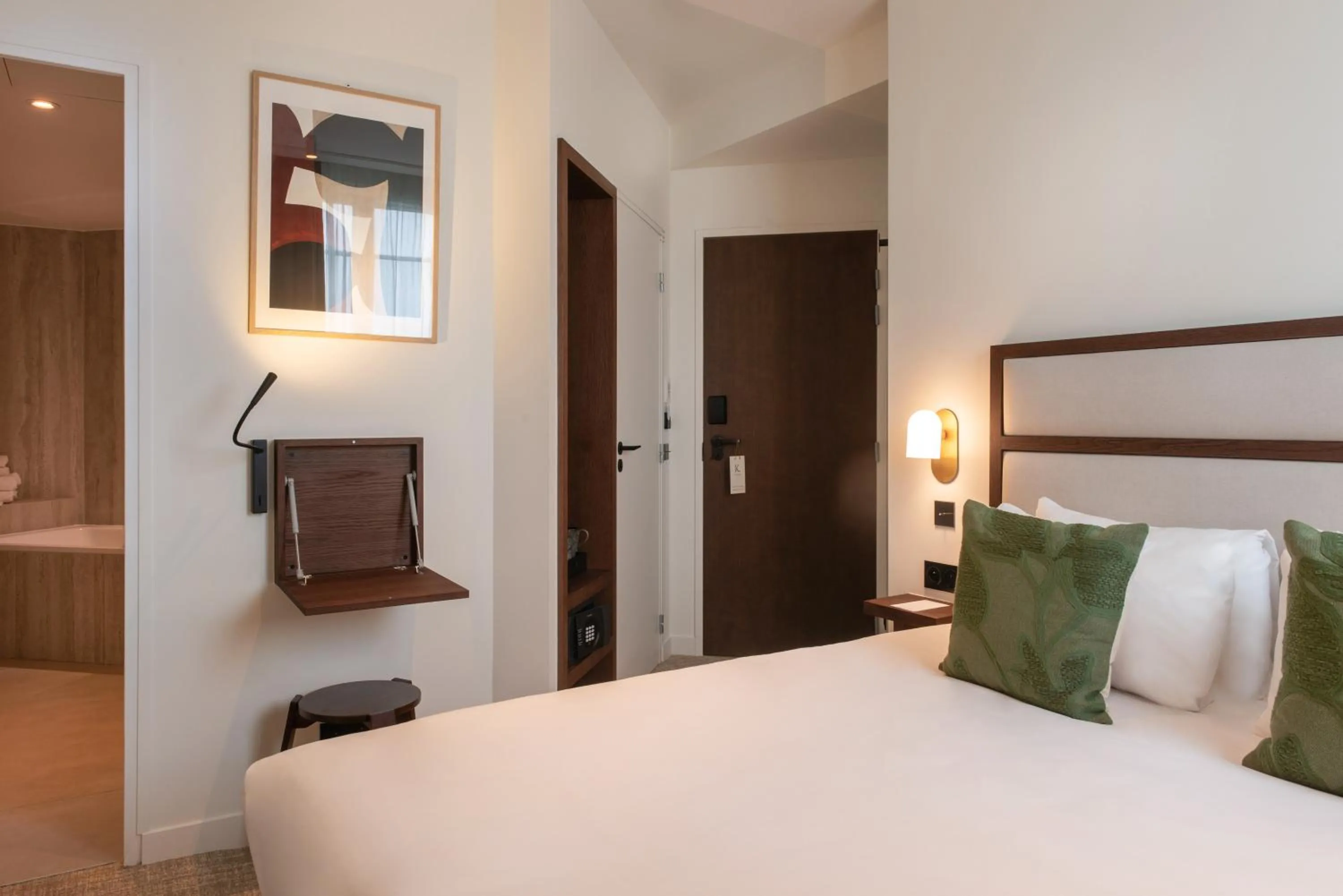 Bed in Le Lampika Hôtel