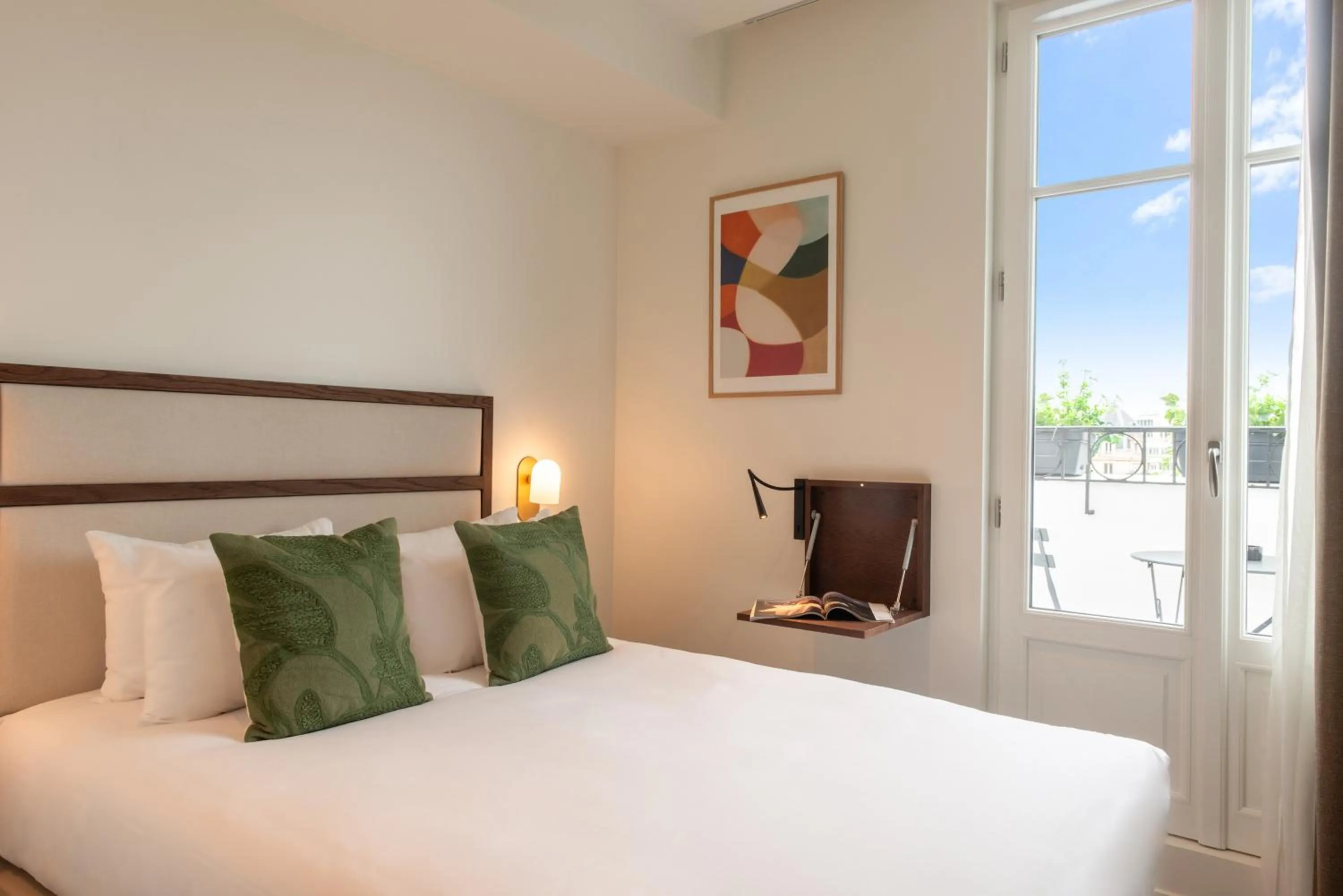 Bed in Le Lampika Hôtel